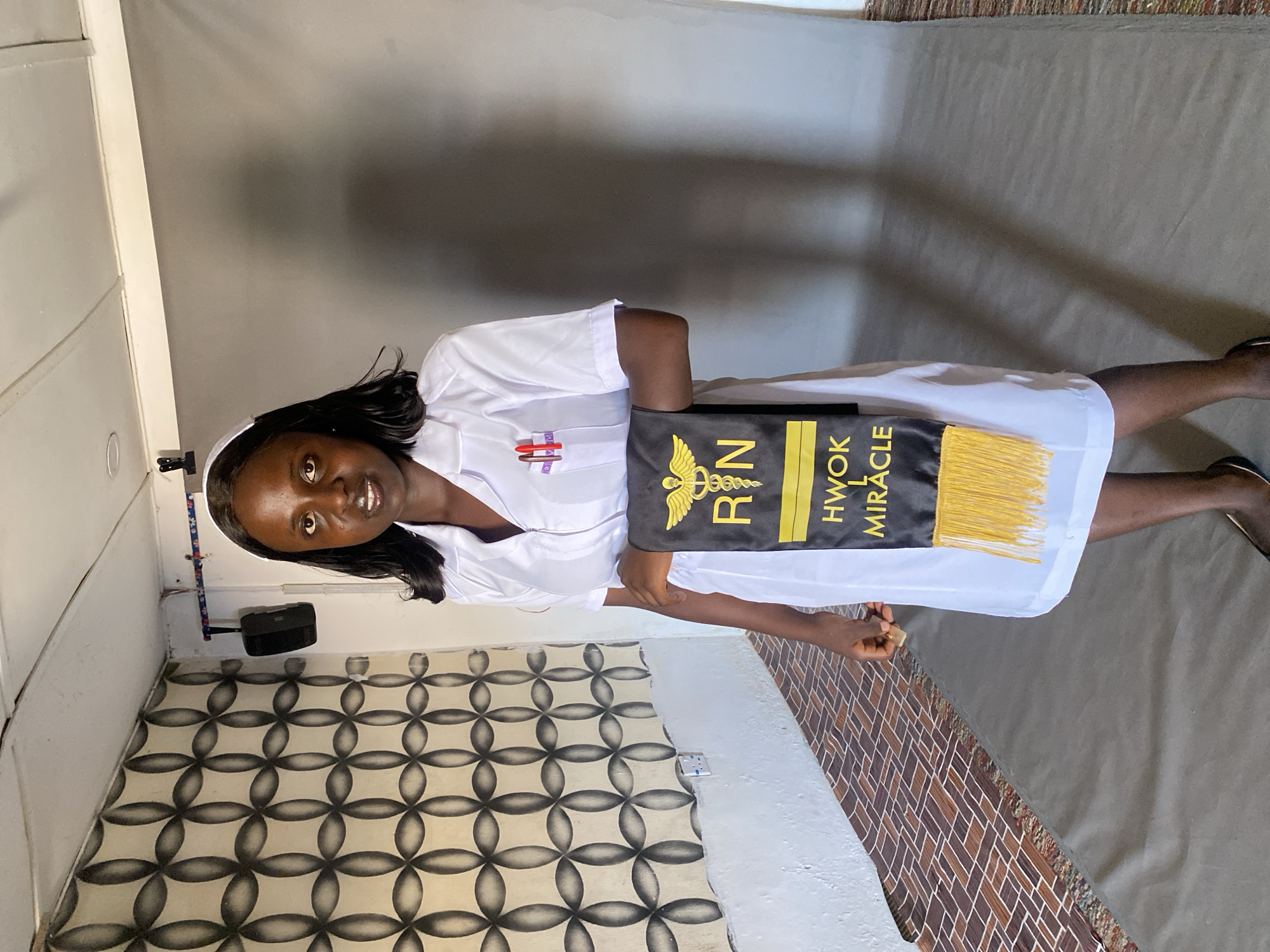 New registered nurse celebrates graduation in Vom, Nigeria