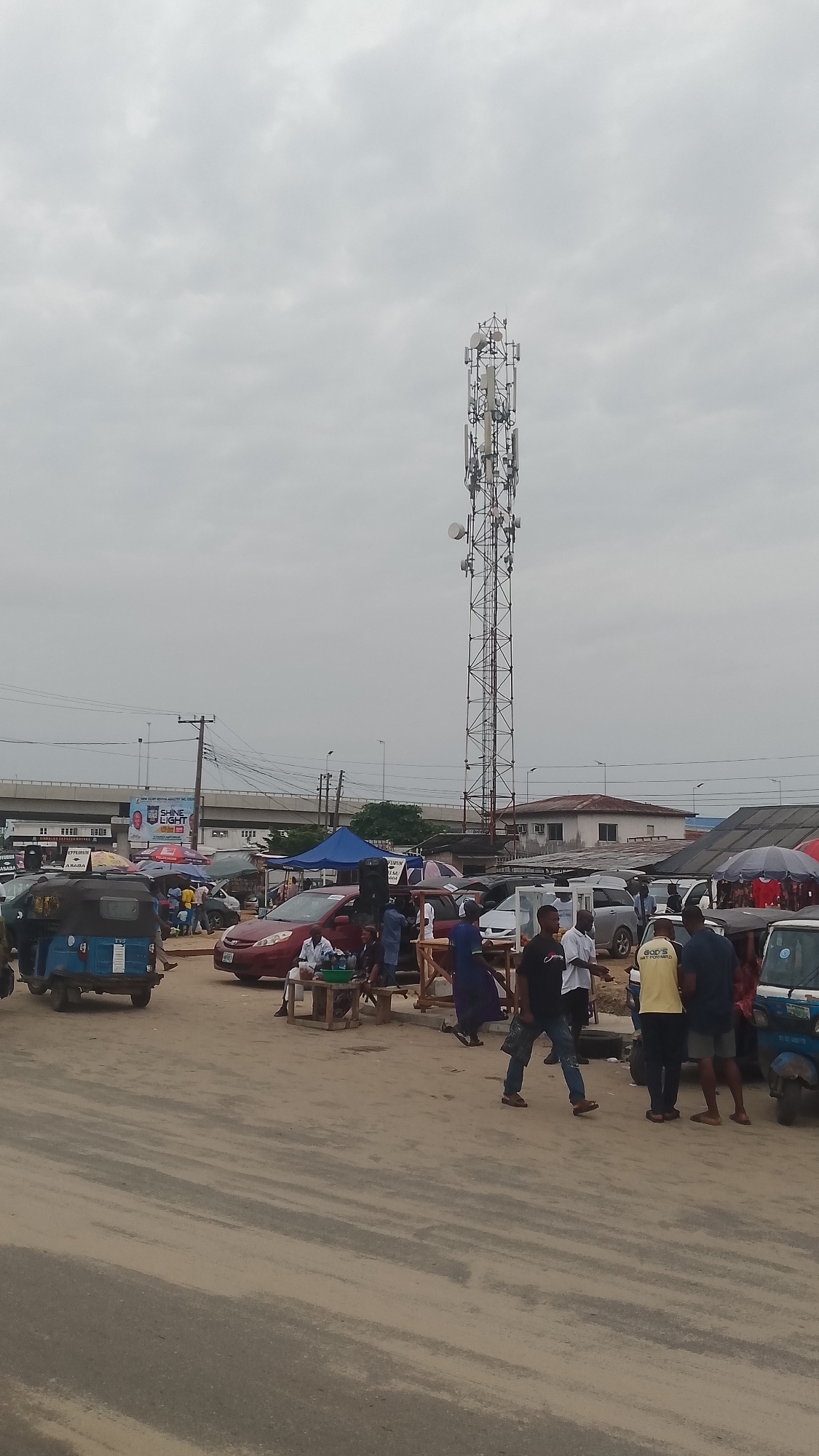 Urban street activity observed with mixed traffic and pedestrians