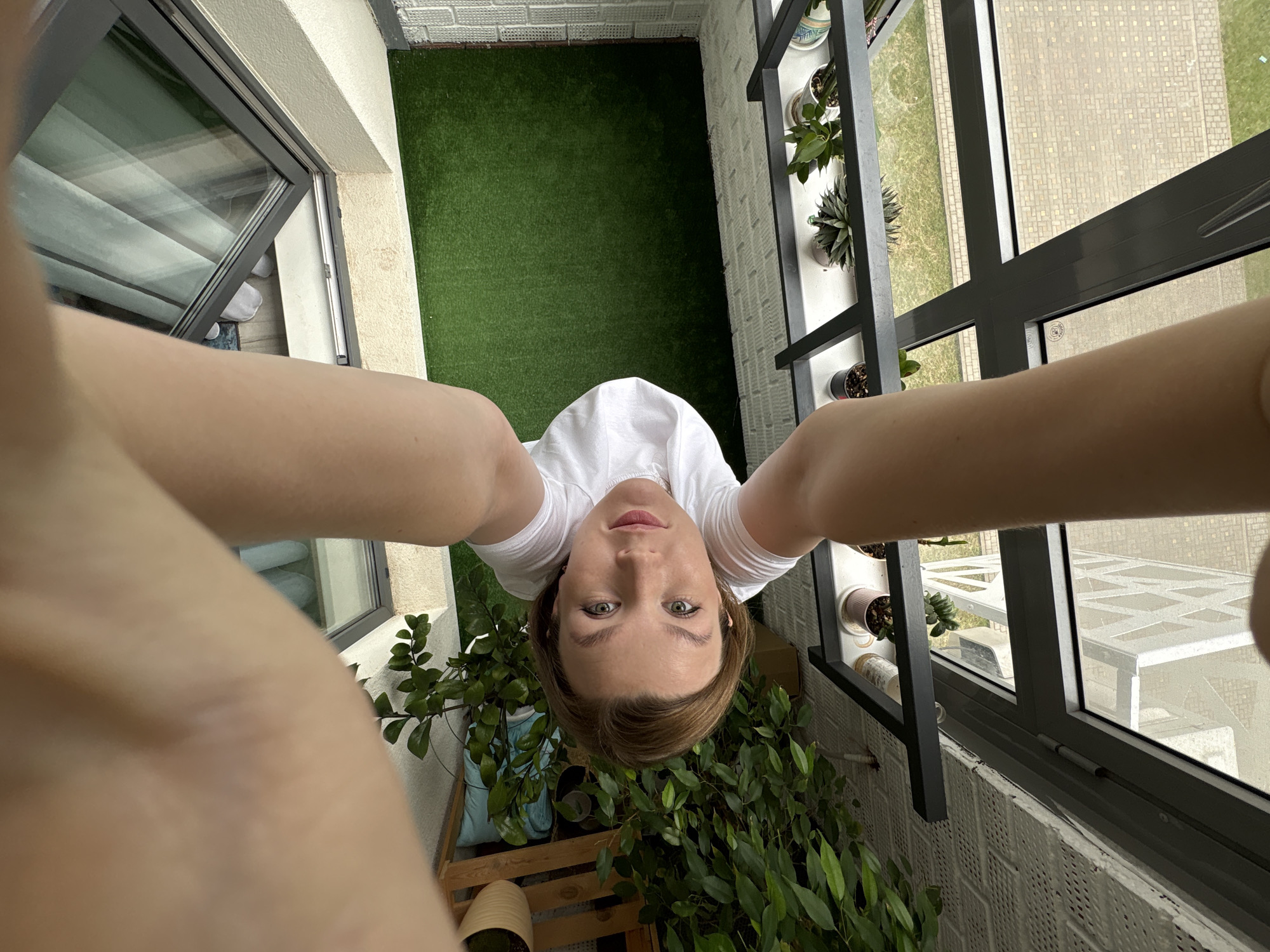 Woman captures selfie series across Izhevsk locations in morning