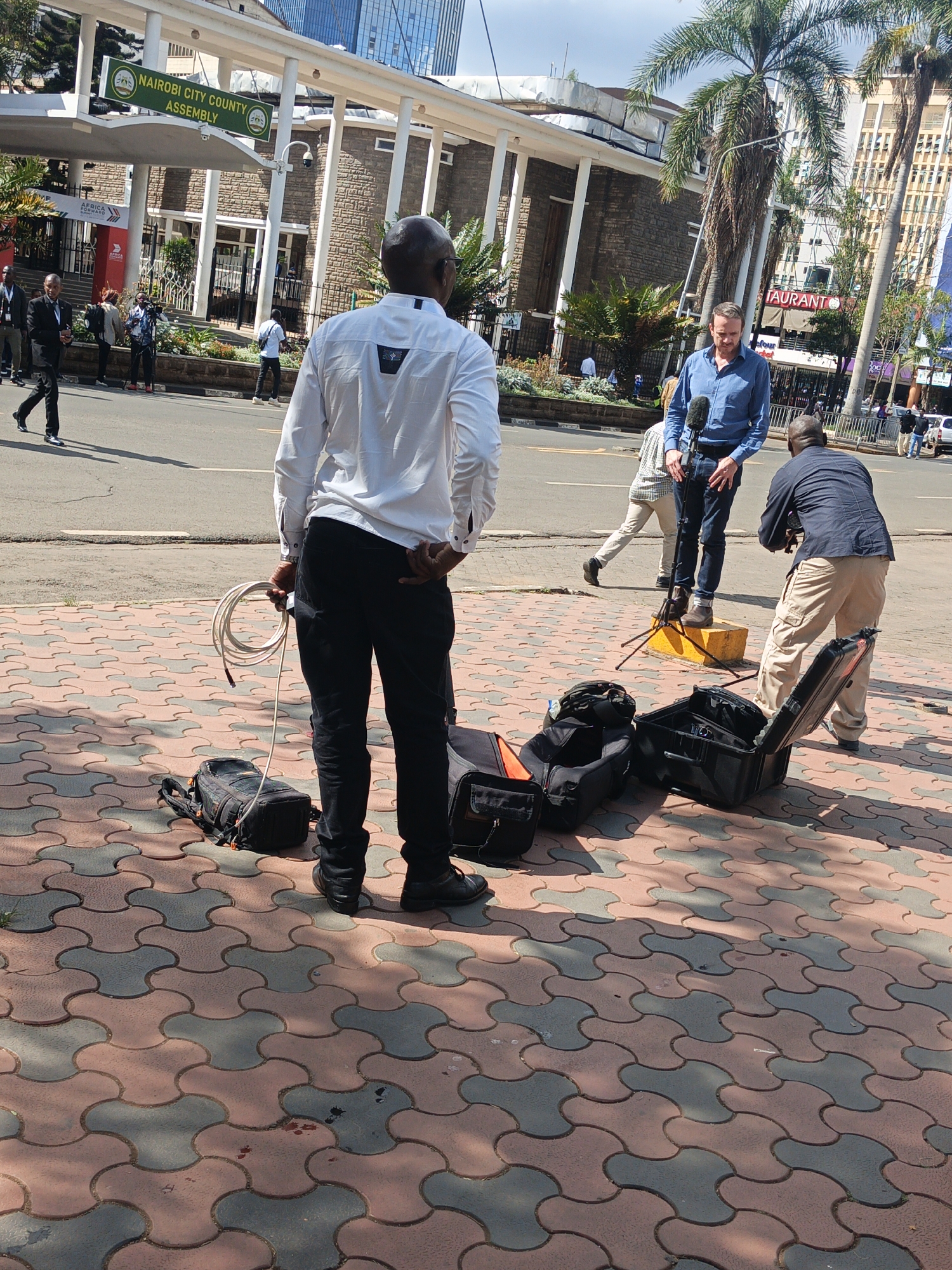 Film crew sets up for video shoot near Nairobi assembly