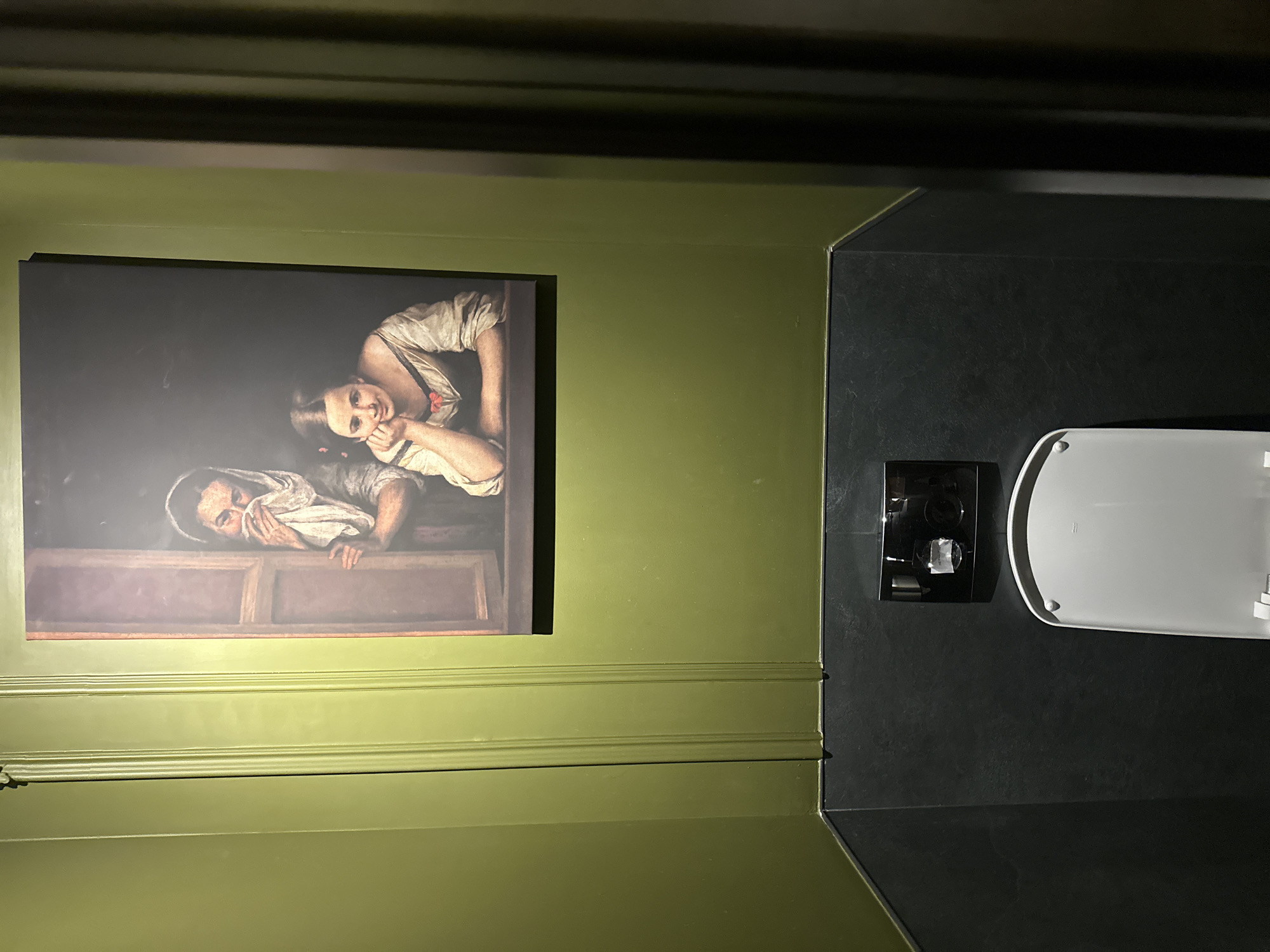 Bathroom features classical art reproduction in Saint Petersburg home