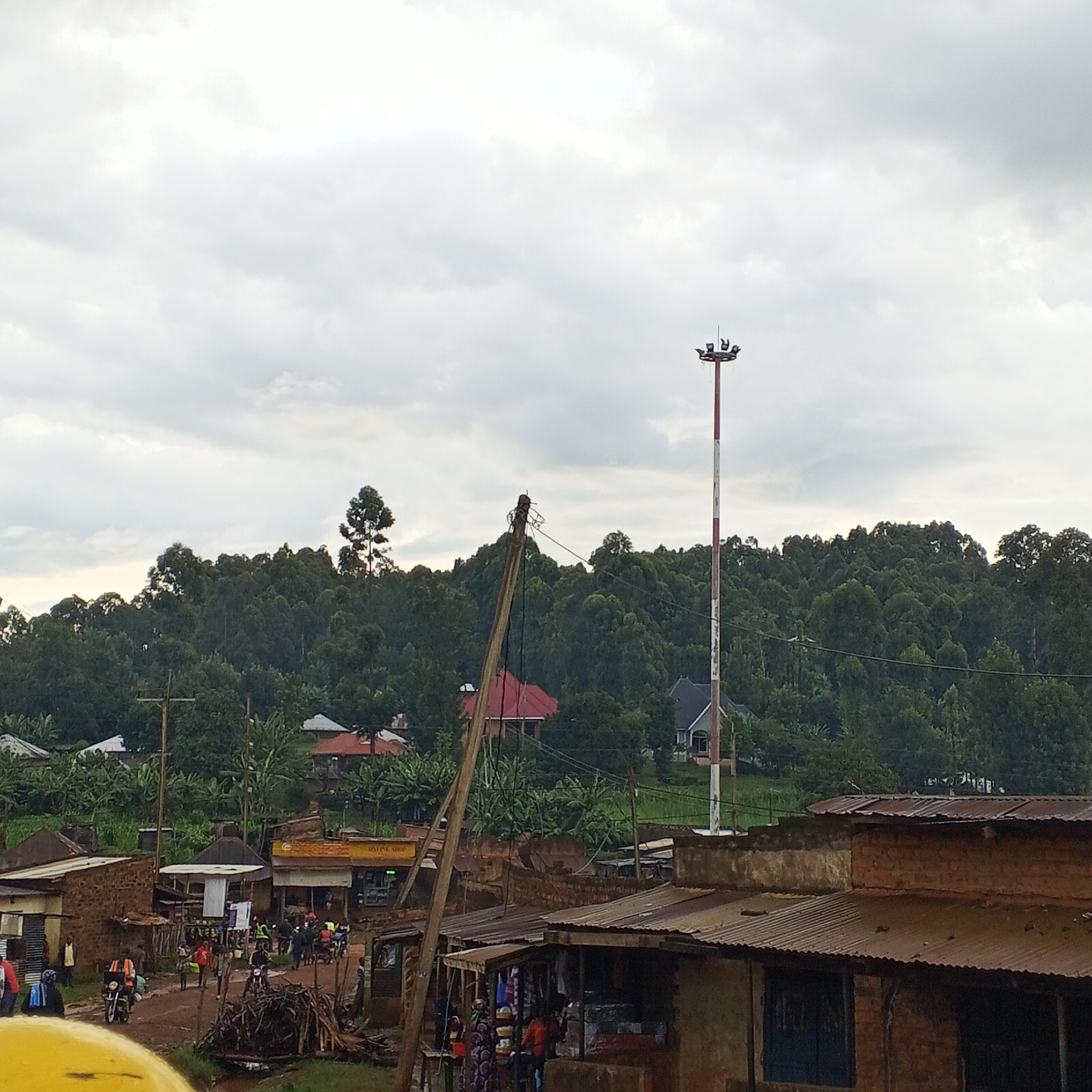 Chainsaw operator cuts logs in Borabu Chitago ward
