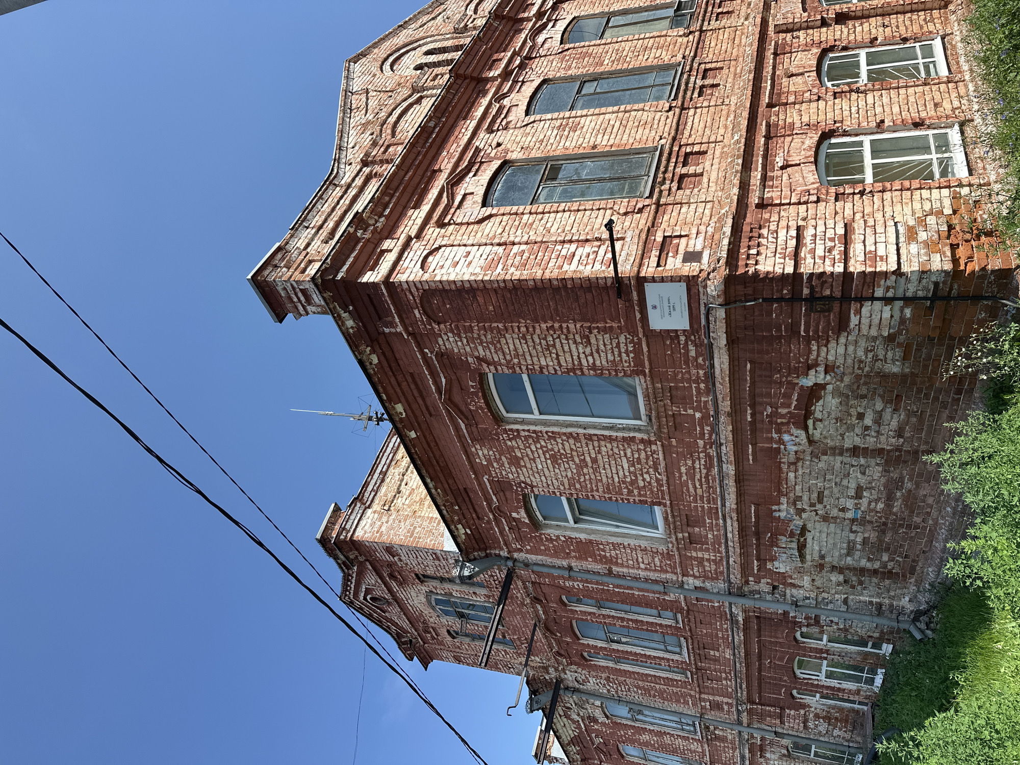 Historic brick and carved wooden buildings in Biysk, Russia