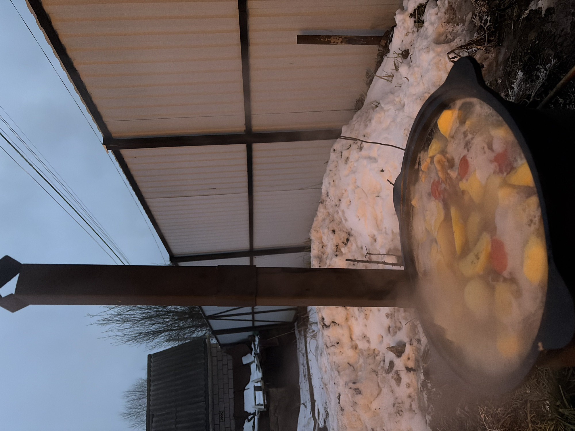 Outdoor cooking observed in snowy Pirogovo, Russia