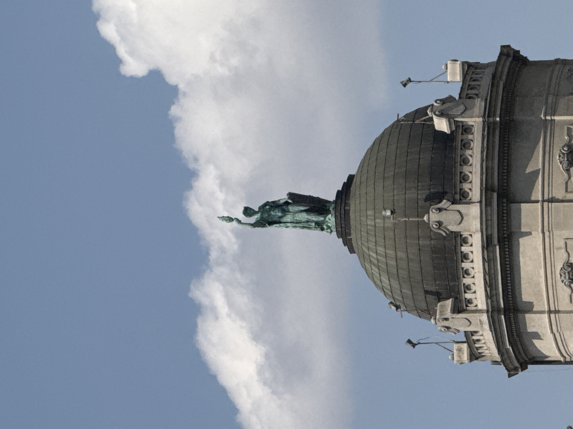 Belgrade civic building: dome, bronze statue, Serbian flag