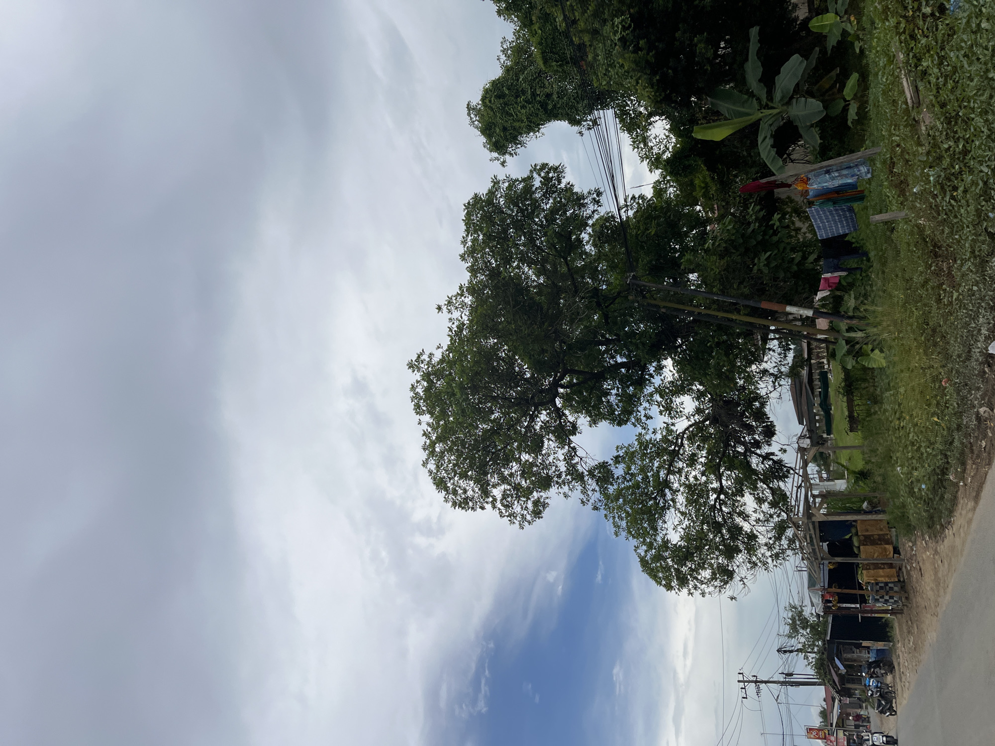 Quiet roadside scenes across three small Indonesian towns