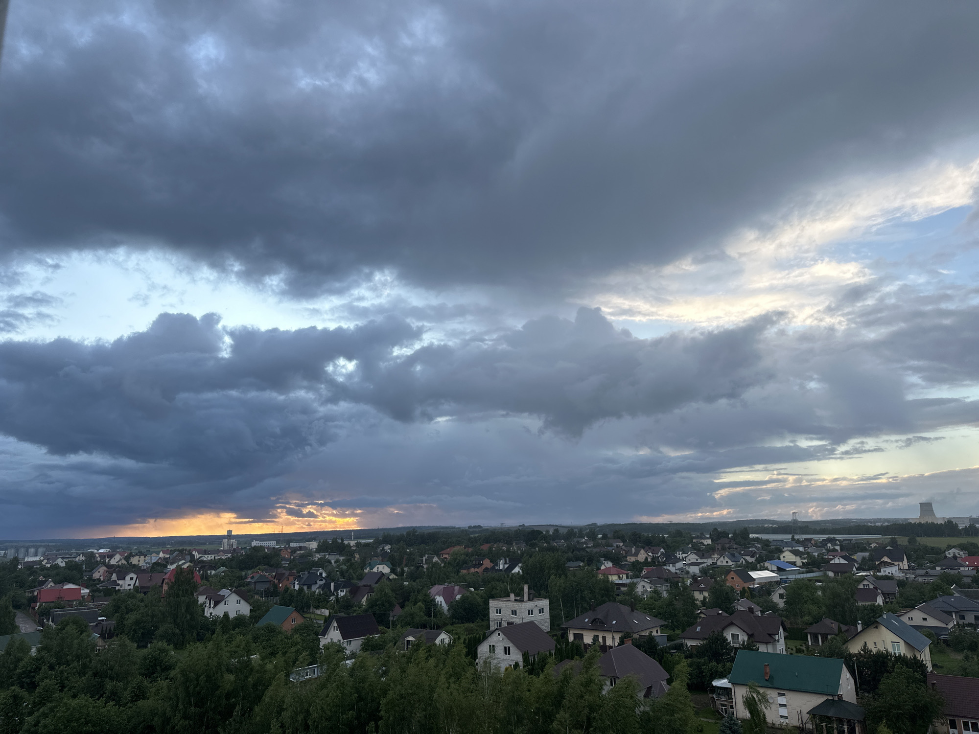 Storm clouds and sunset collide over suburban Minsk outskirts