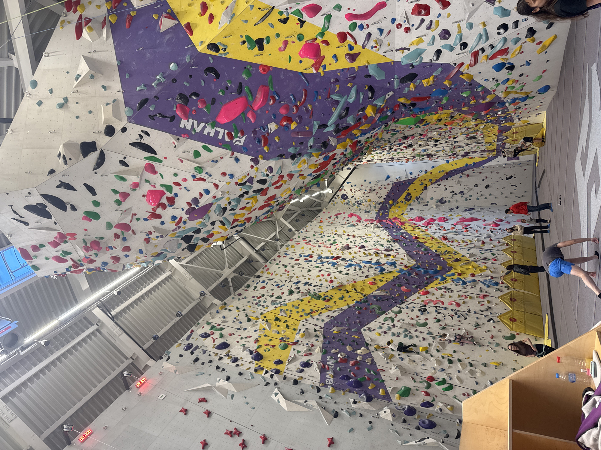 Man rock climbs at indoor gym in Sofia