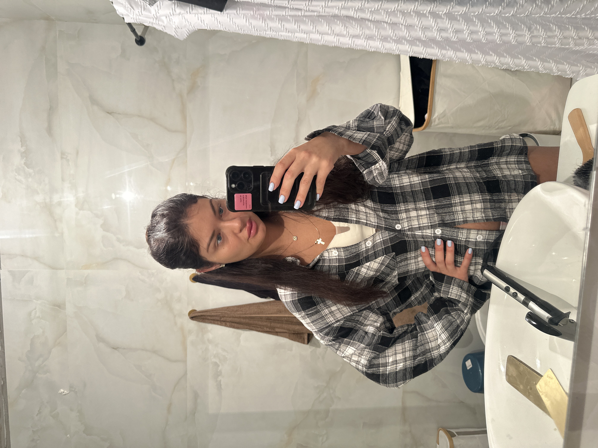 Woman takes bathroom selfie in Khimki, Russia