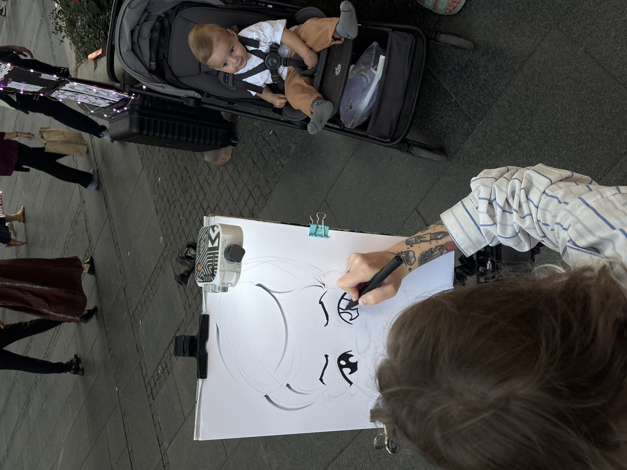 Street caricature artist at work on Belgrade's main pedestrian promenade