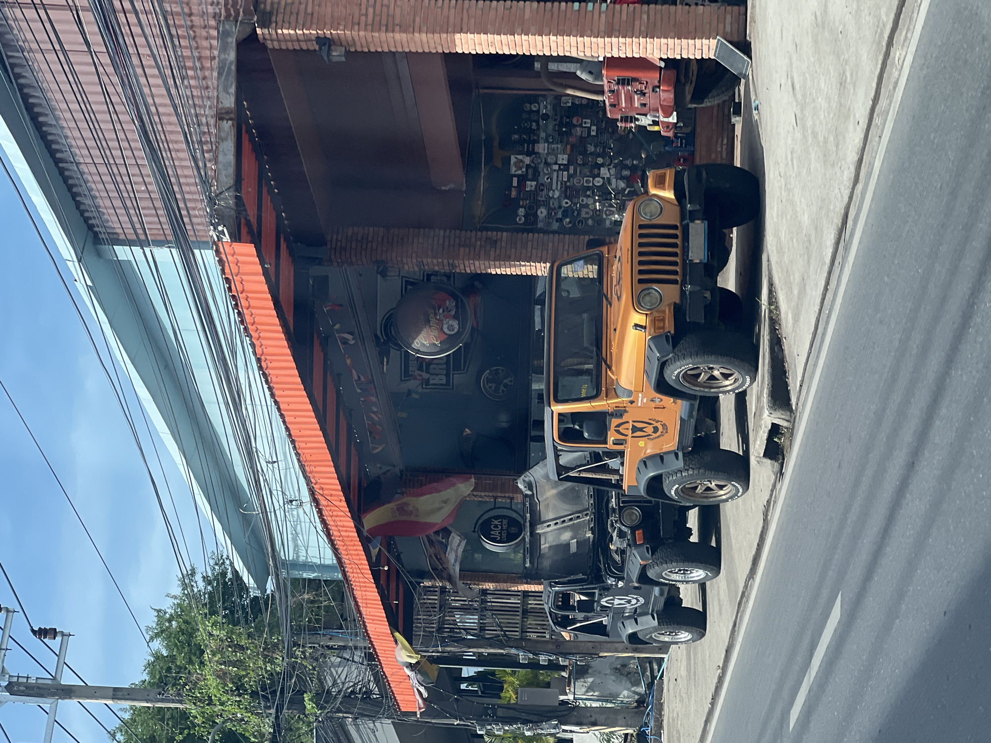 Street scenes from Ko Samui: cars, traffic, and a café