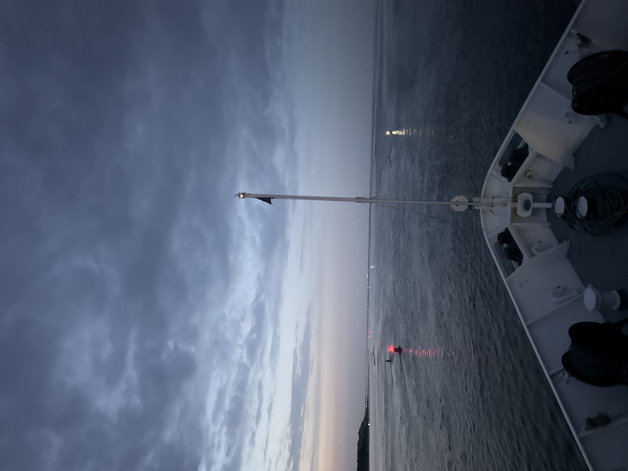 Dusk navigation through a buoyed channel near Shlisselburg