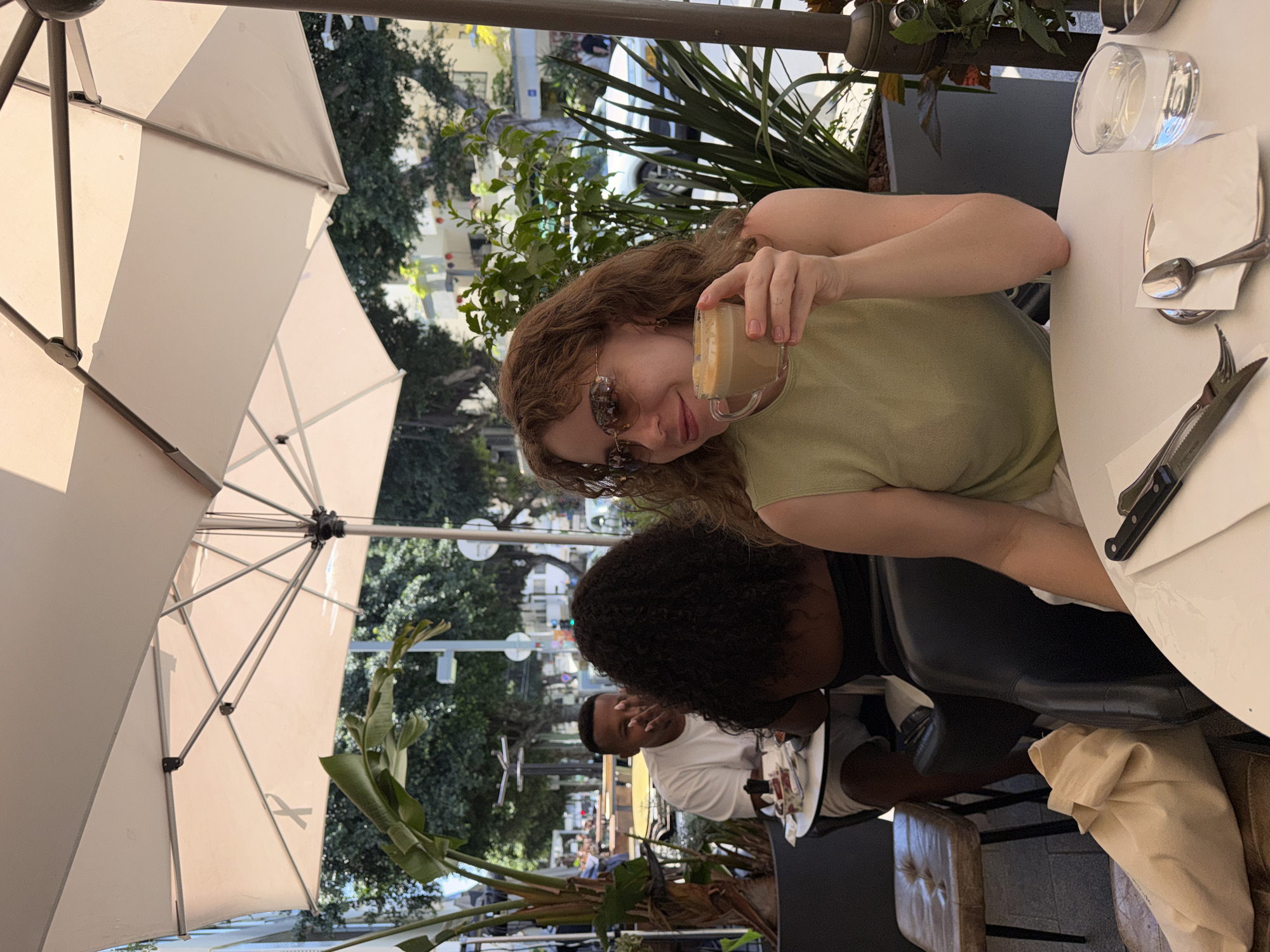 Morning street life documented across Tel Aviv cafés and crosswalks
