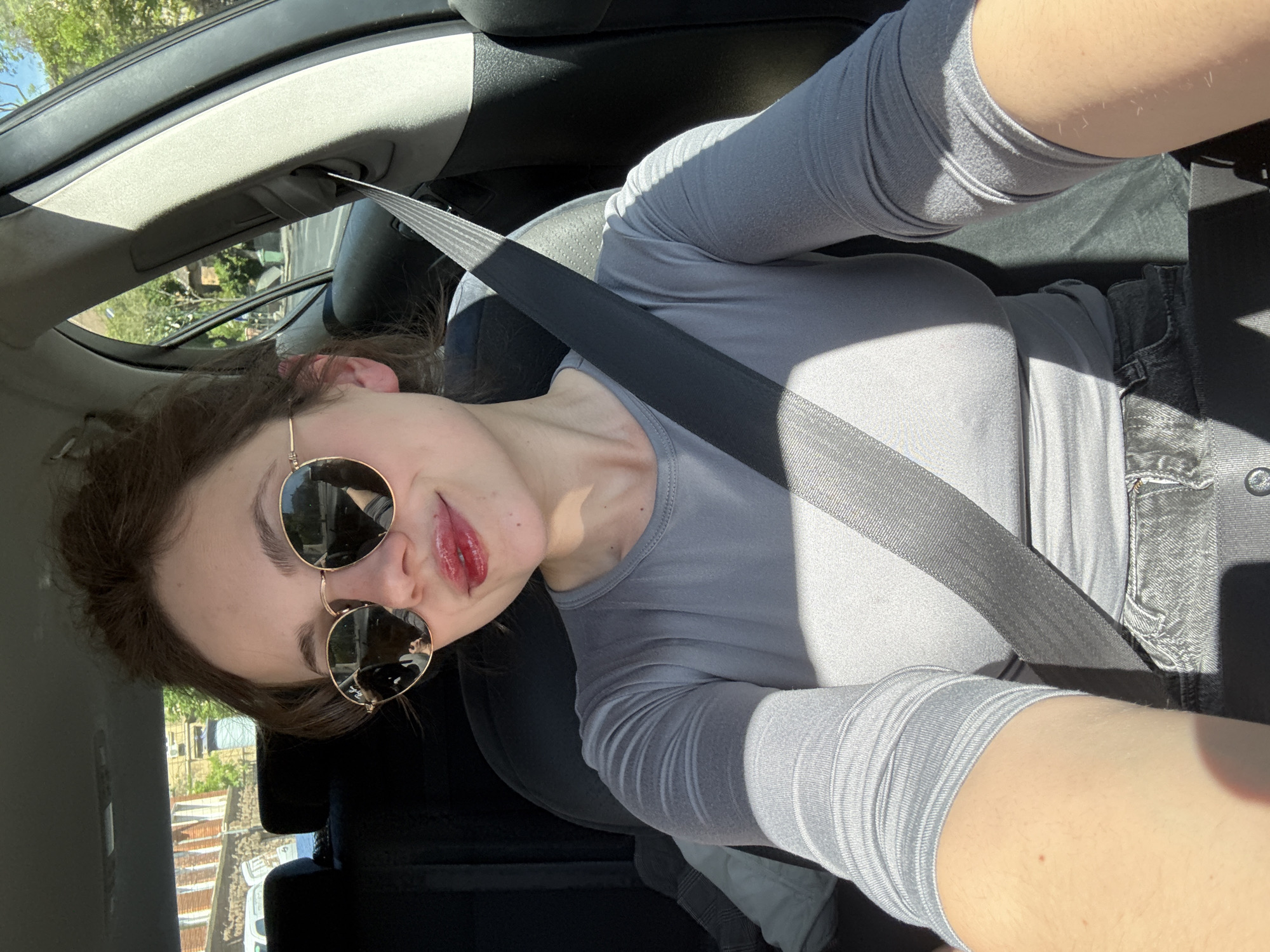 Woman in sunglasses spotted driving in Budapest