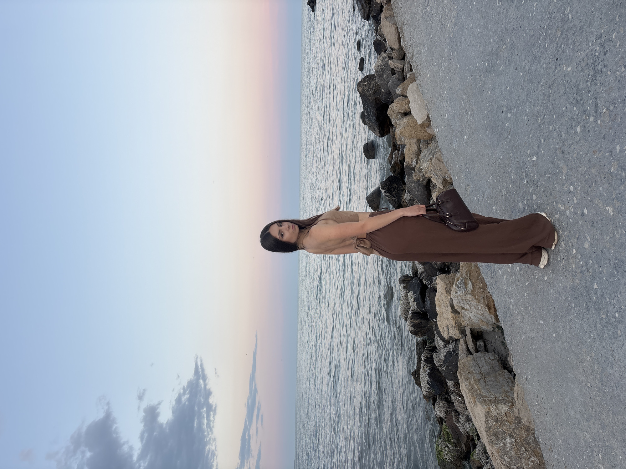 Quiet moment on Varna's rocky shoreline at golden hour