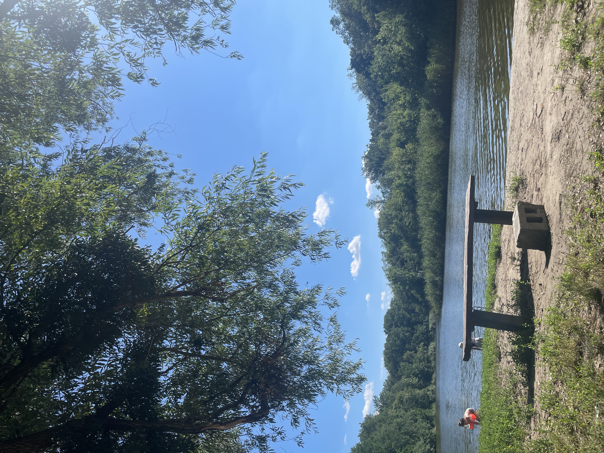 Selfies by a calm riverbank in Zarichne, Ukraine