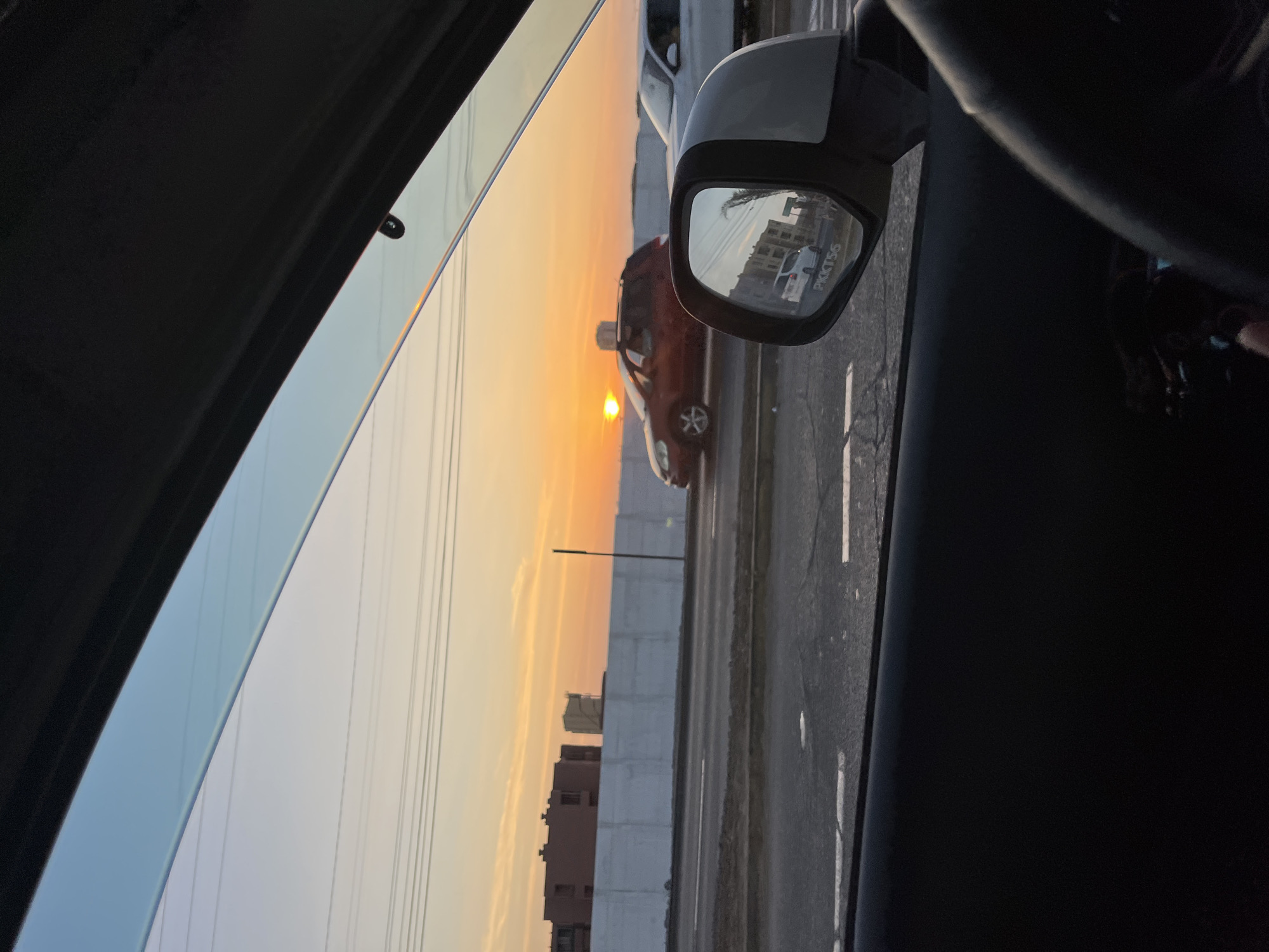 Vibrant sunset observed from vehicle in Arica, Chile