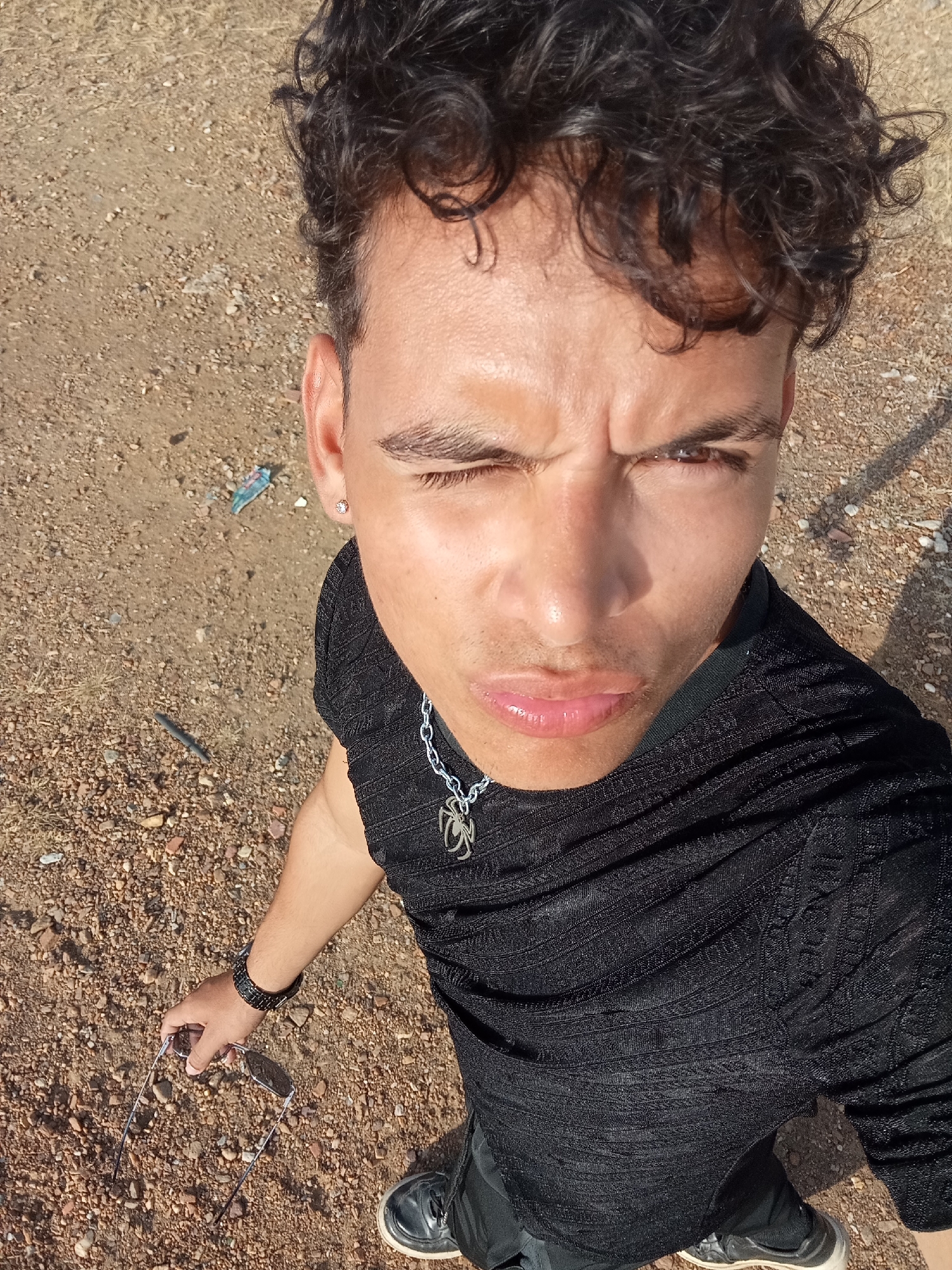 Young man takes multiple selfies across Venezuelan locations