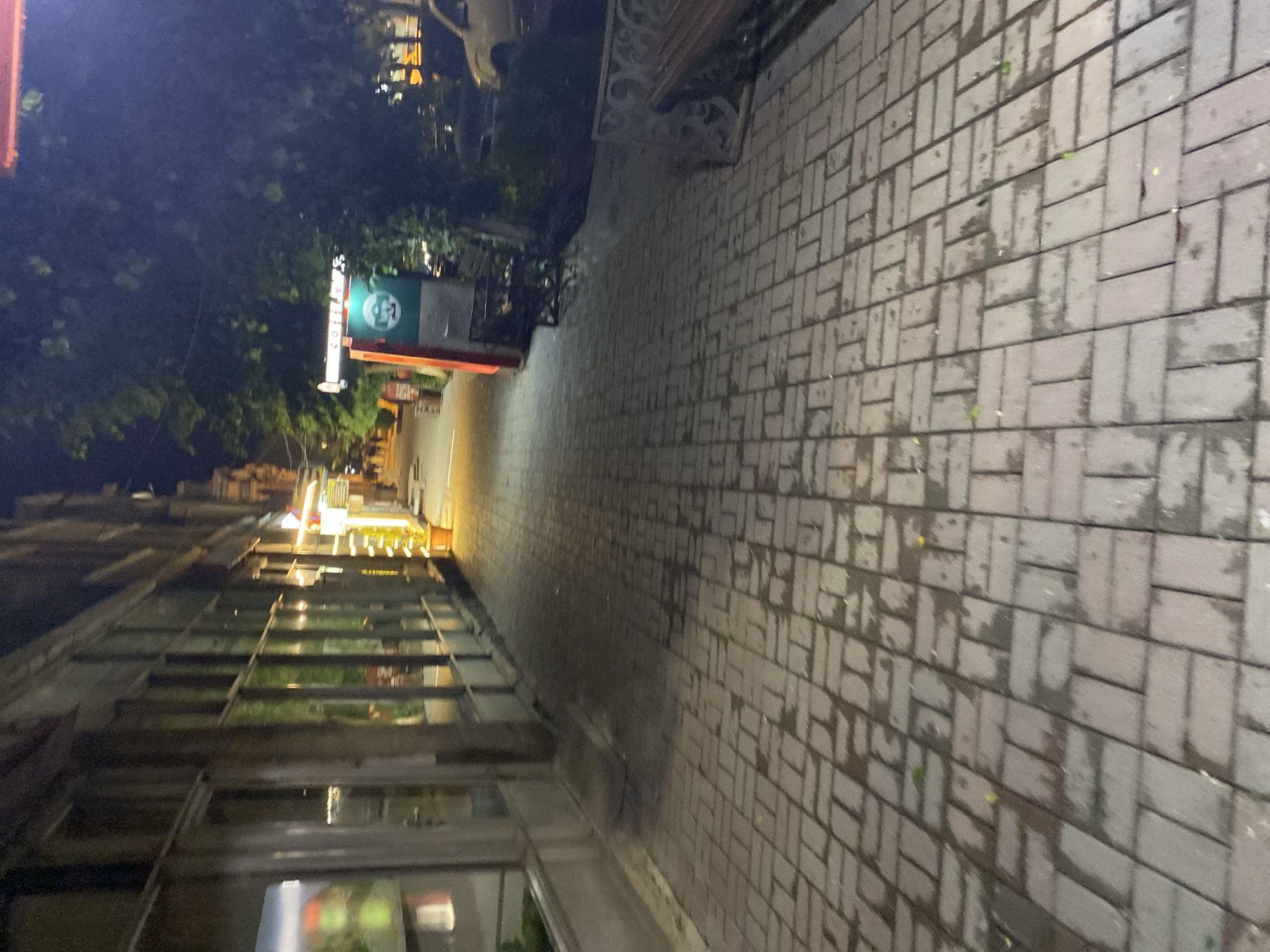 Rainy evening captured on Gyumri streets near October cinema