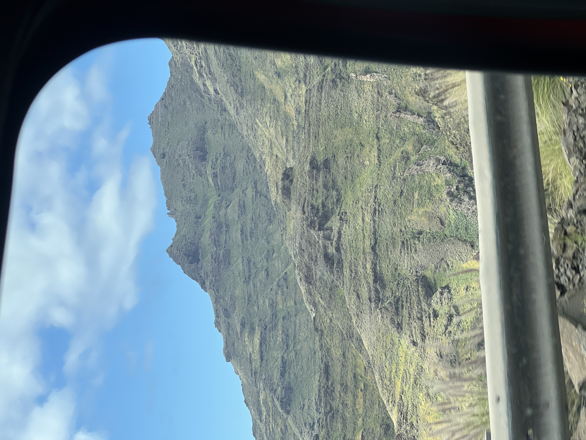 Driver documents colorful mountain geology along Mogán road