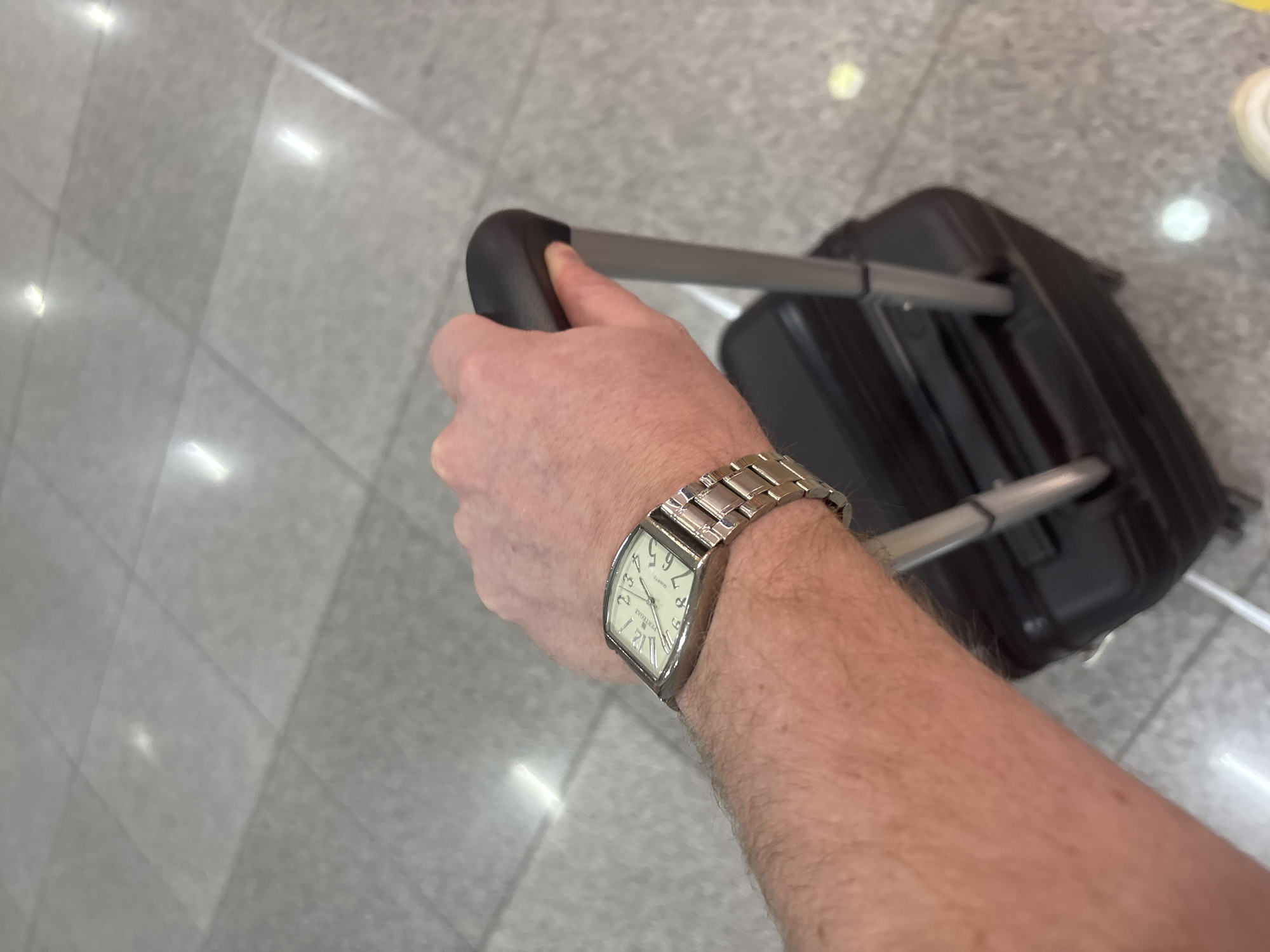 Traveler with suitcase spotted in Mexico City evening