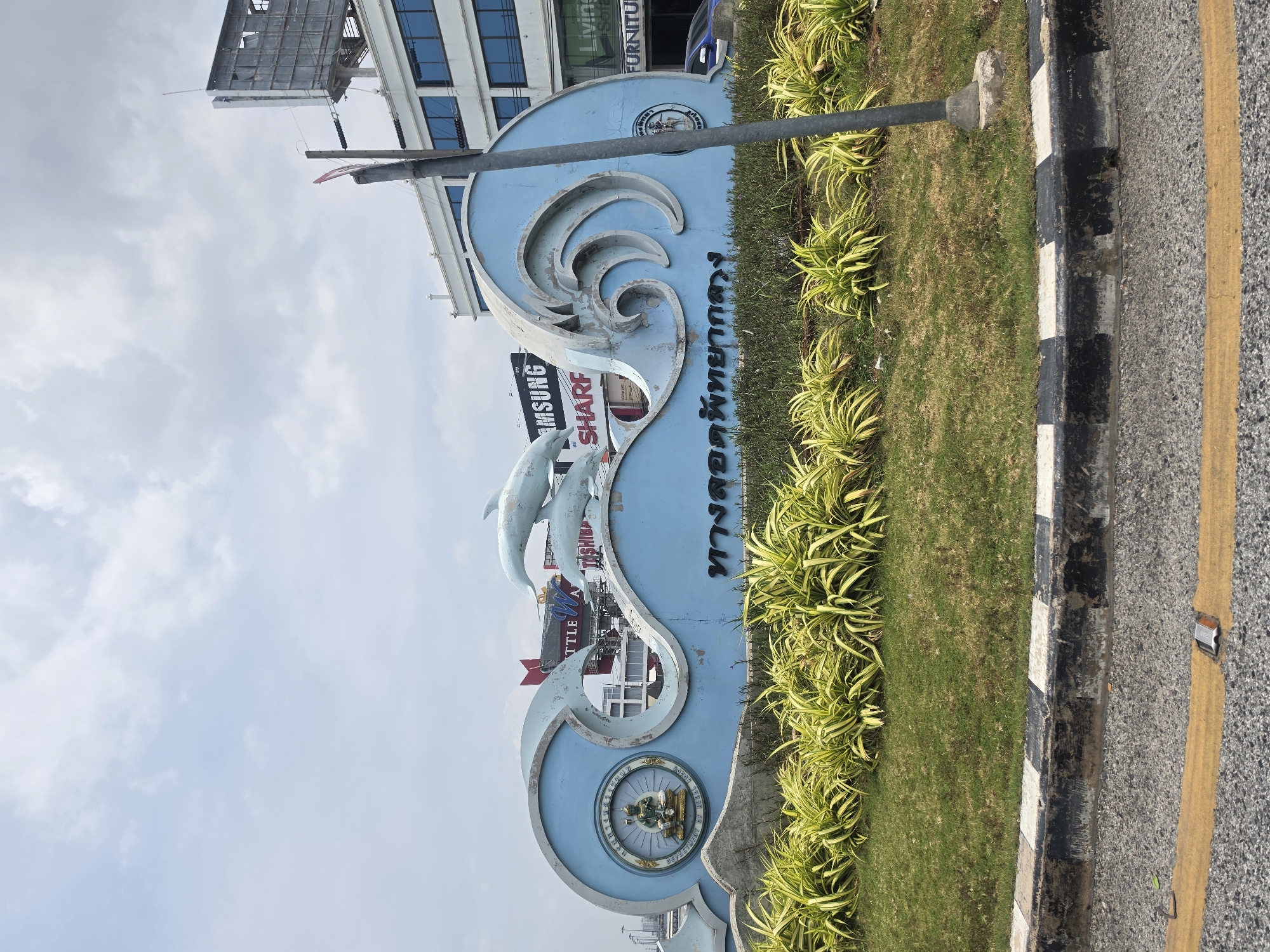 Pattaya City entrance monument with wave patterns documented