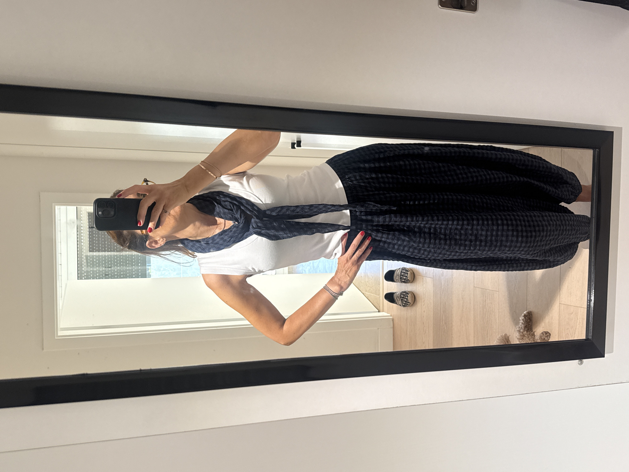 Woman takes mirror selfie in Loures, Portugal