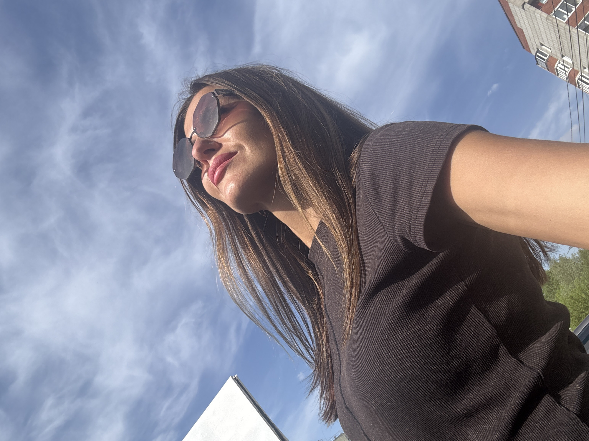 Woman takes selfies outdoors in Chaikovsky, Russia