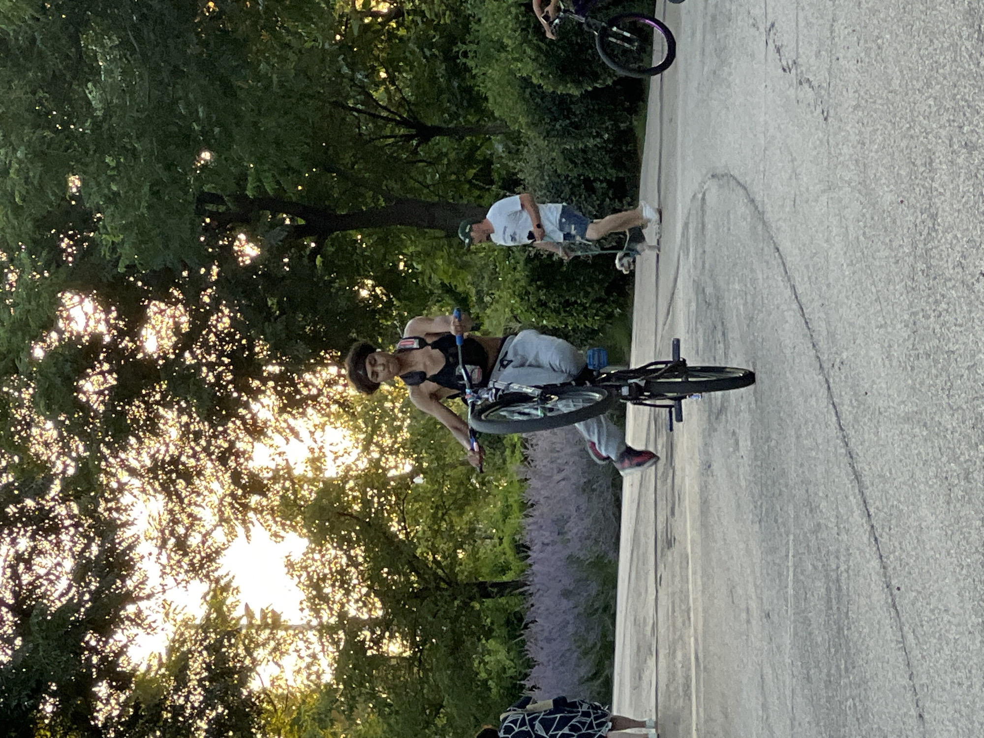Cyclists, skaters, and riders roll through Madrid at golden hour