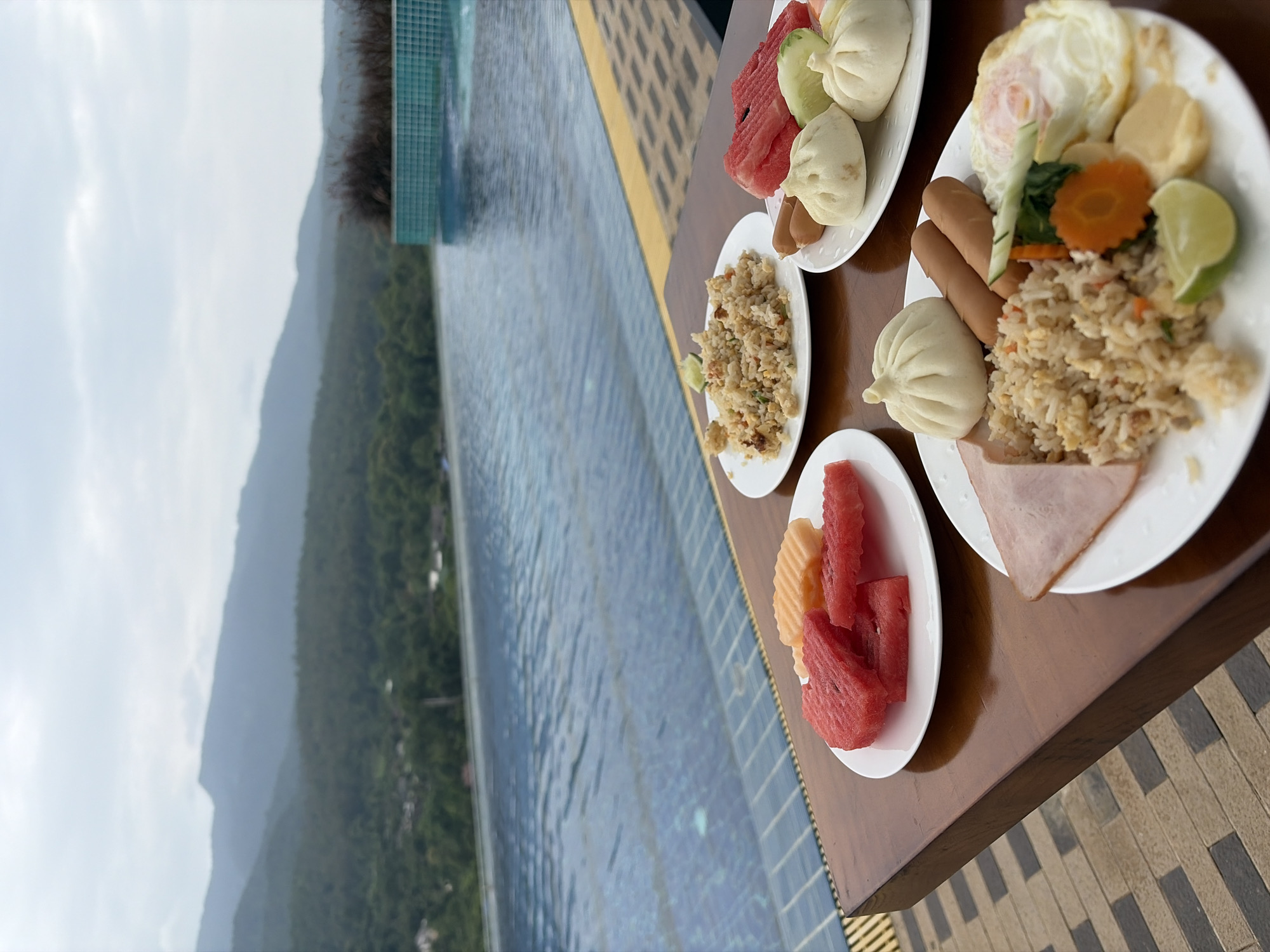 Poolside breakfast at a lush mountain resort in northern Thailand