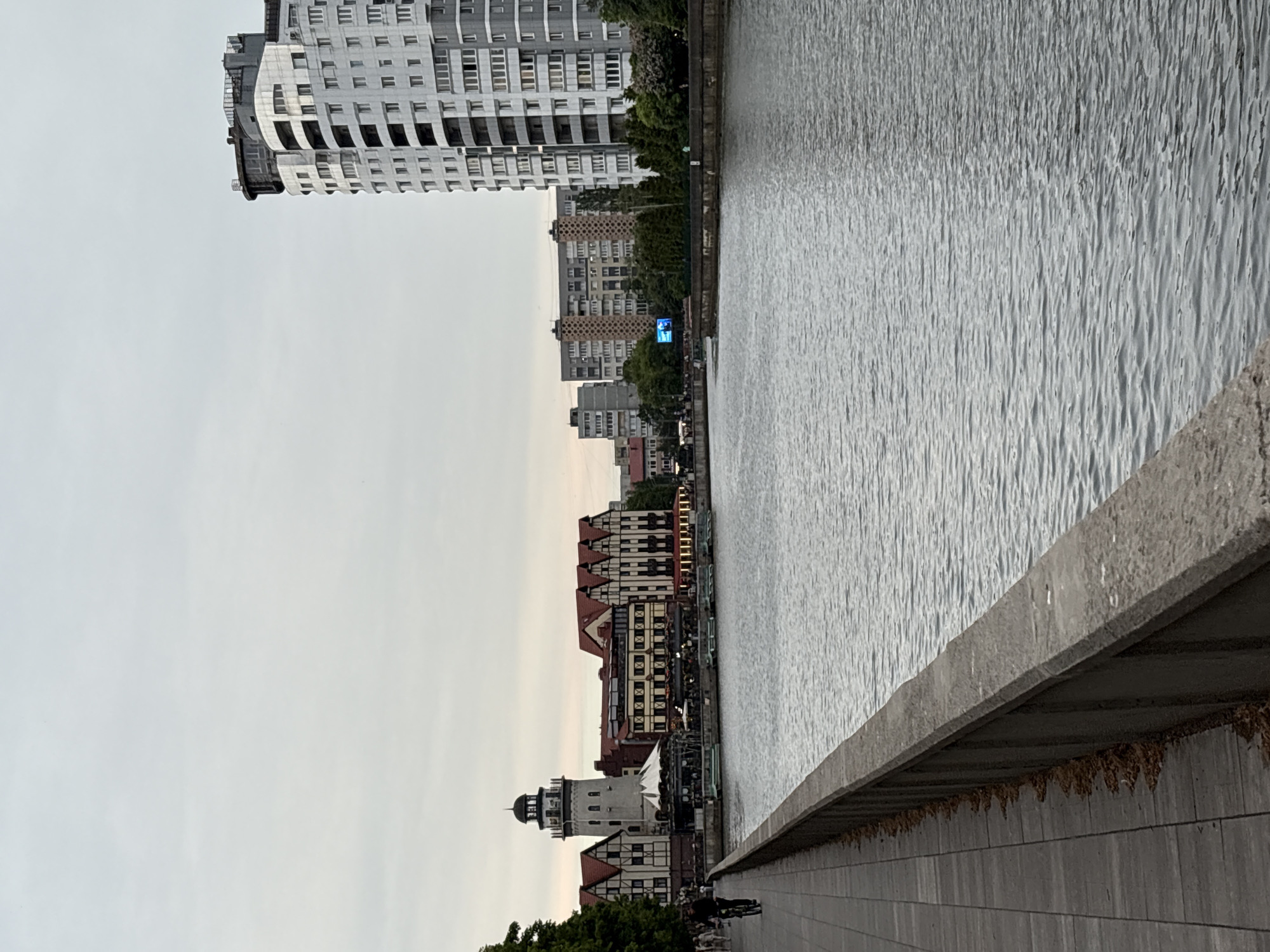 Tourist documents evening walk through historic Kaliningrad cathedral district