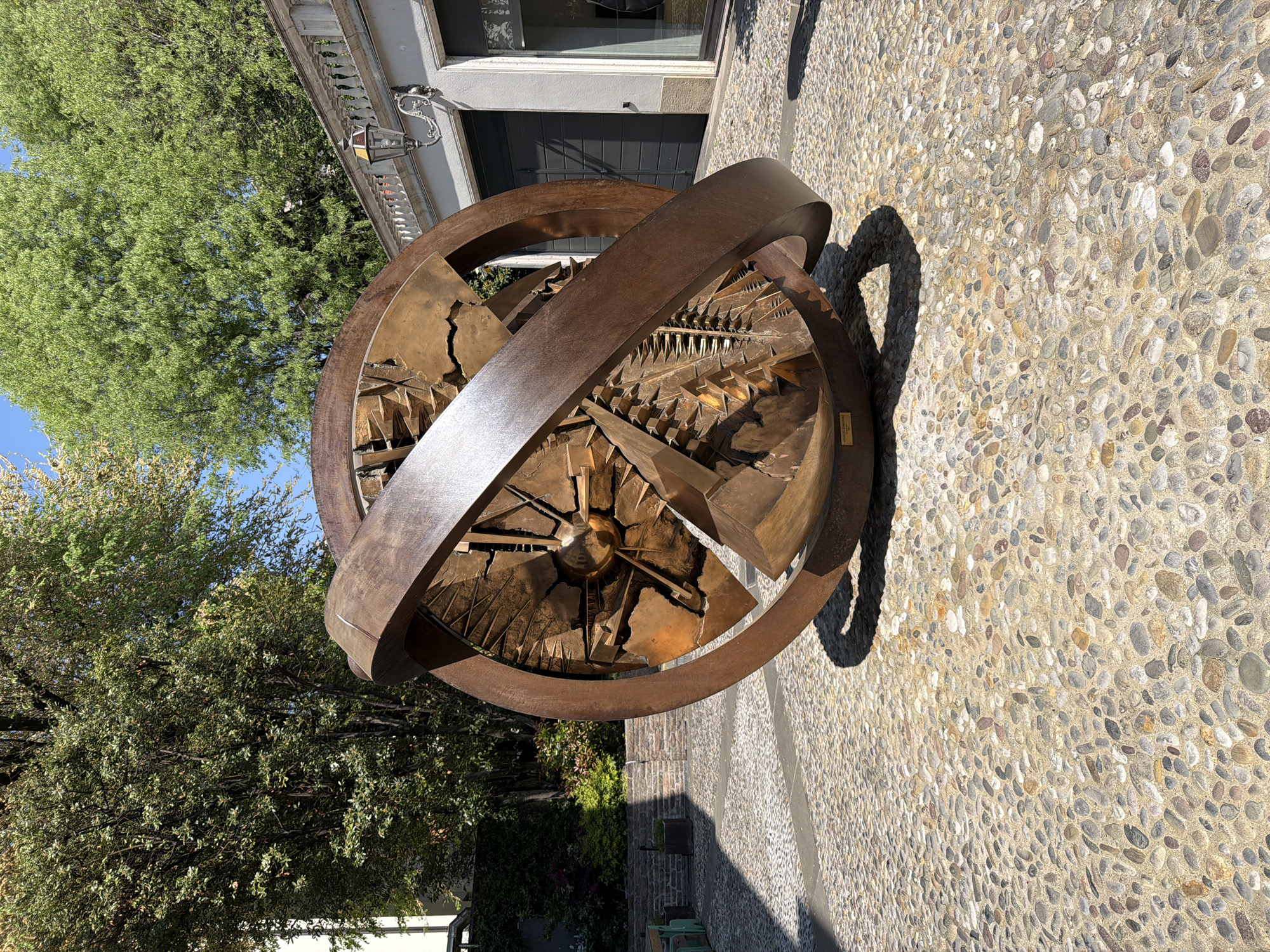 Tourist documents historic landmarks during Bergamo walking tour