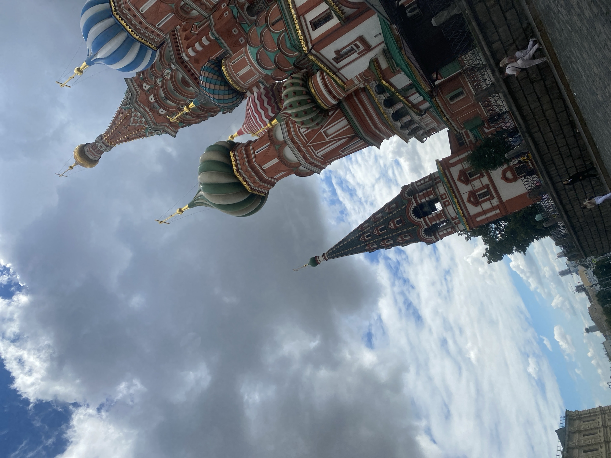 Low-angle look at Saint Basil's Cathedral under cloudy skies