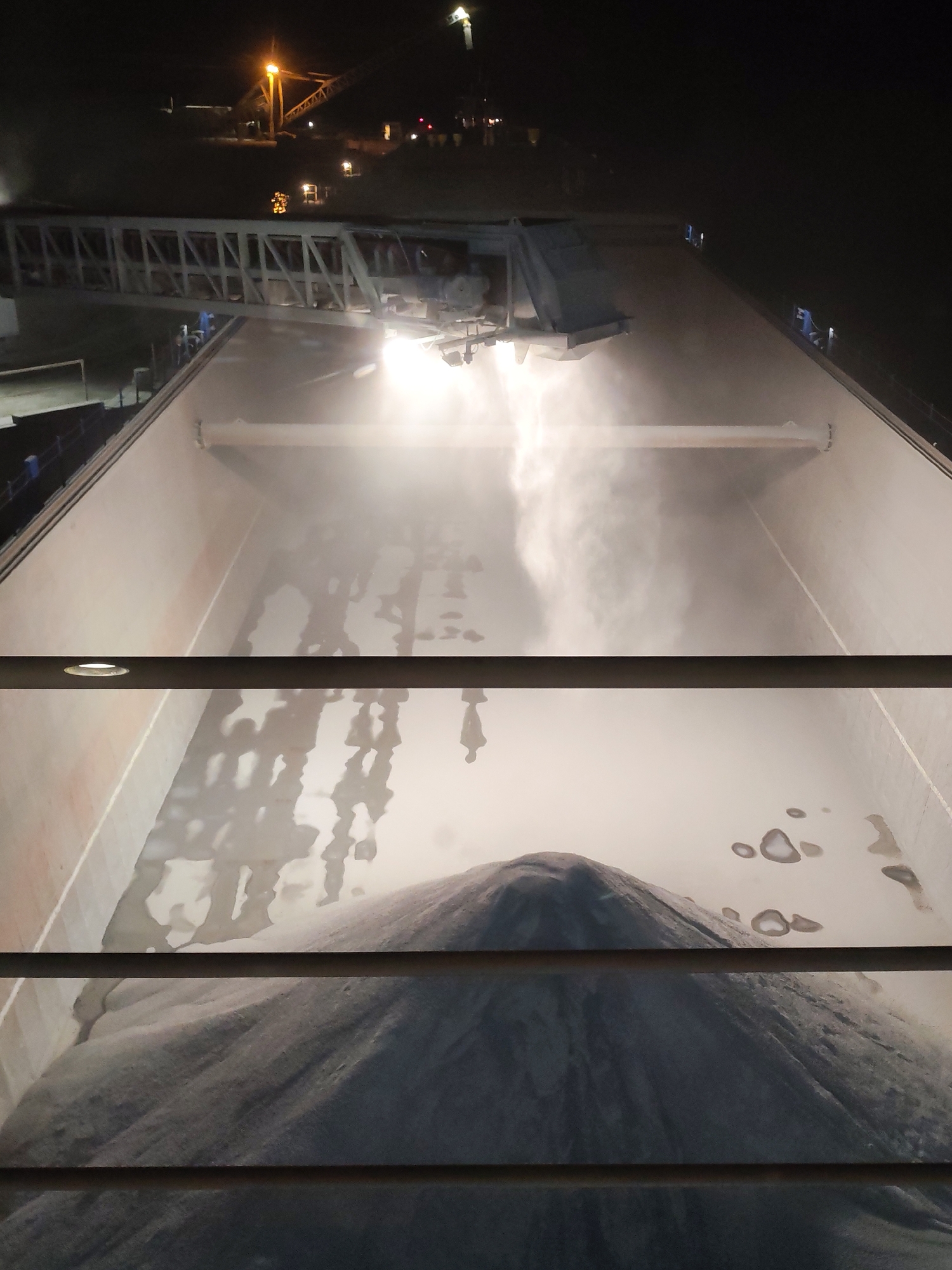 Night cargo loading operations documented in Shcheleiki, Russia