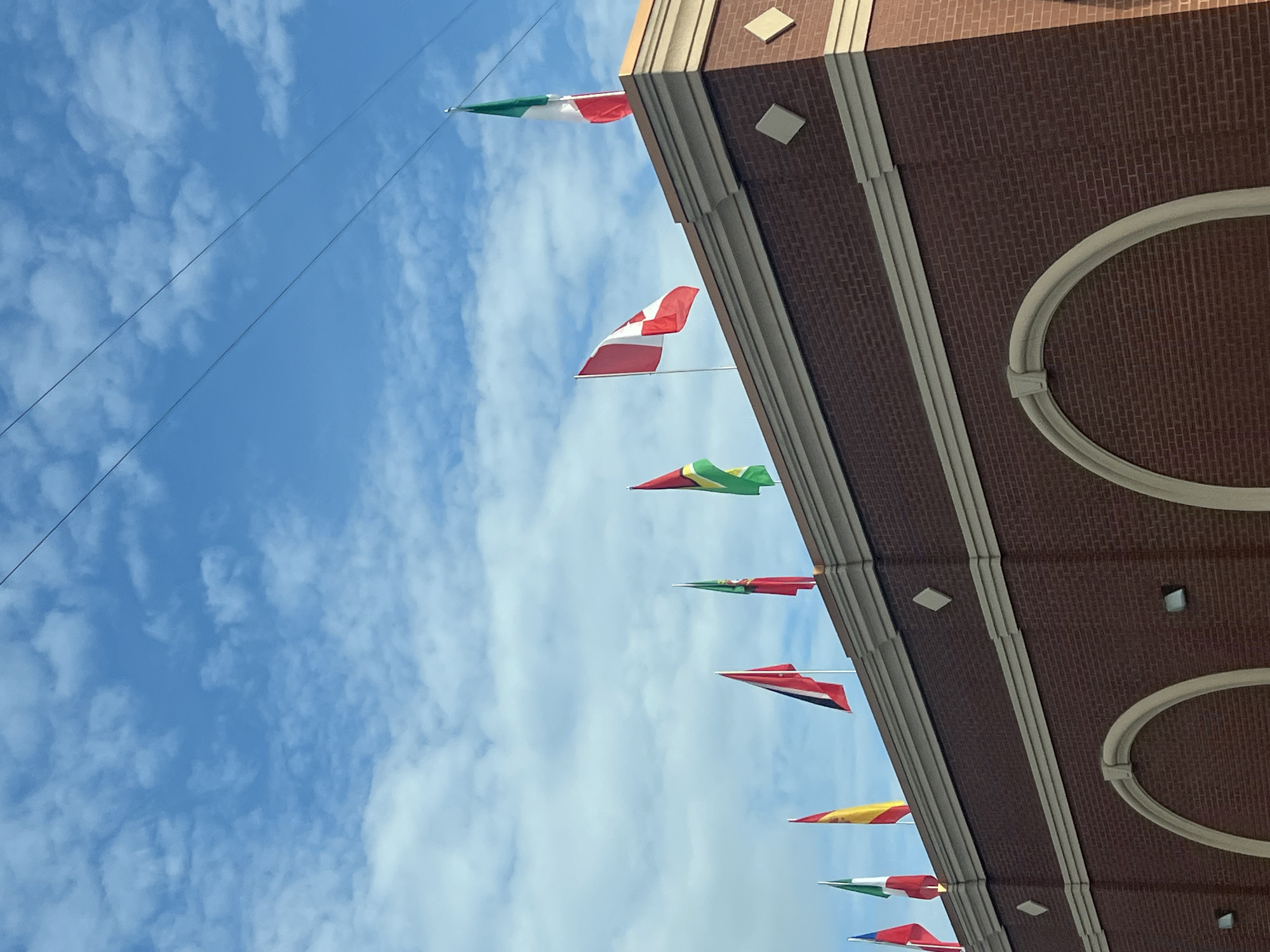 Routine street scenes captured across Newburgh showing flags, gas prices