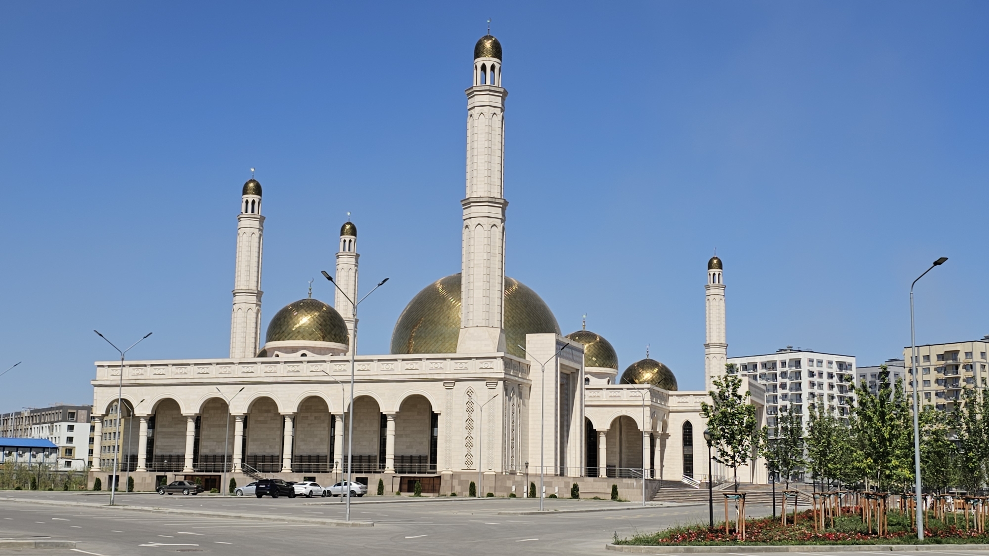 Hazrat Sultan Mosque stands under clear skies in Almaty