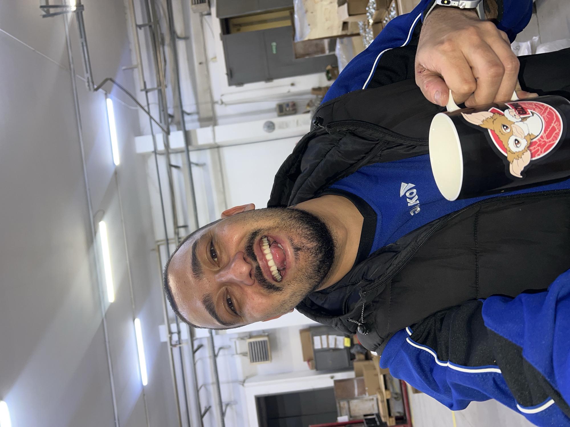 Man enjoys coffee break in Bulgarian industrial facility