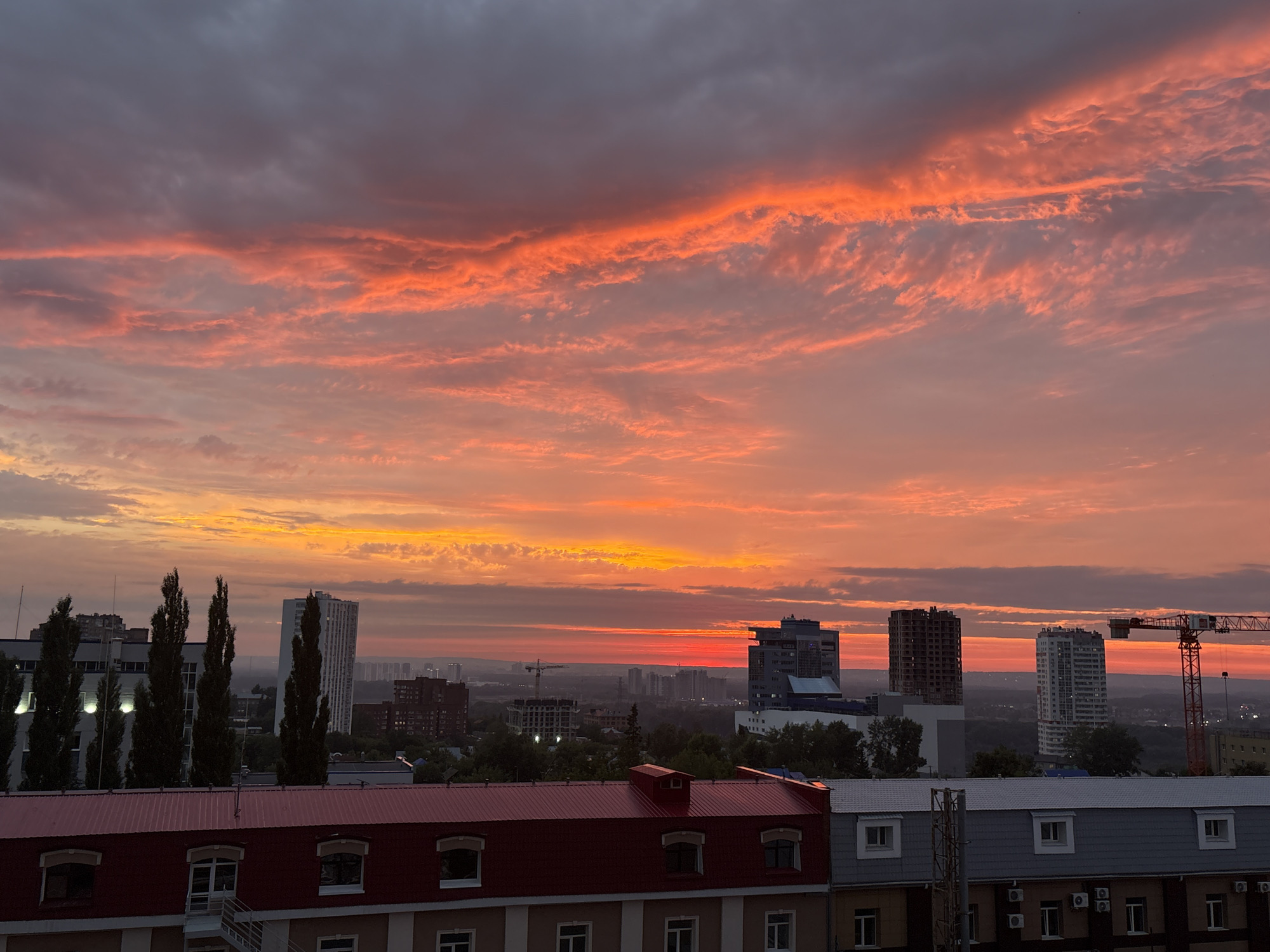 Fiery summer sunset over the Ufa skyline