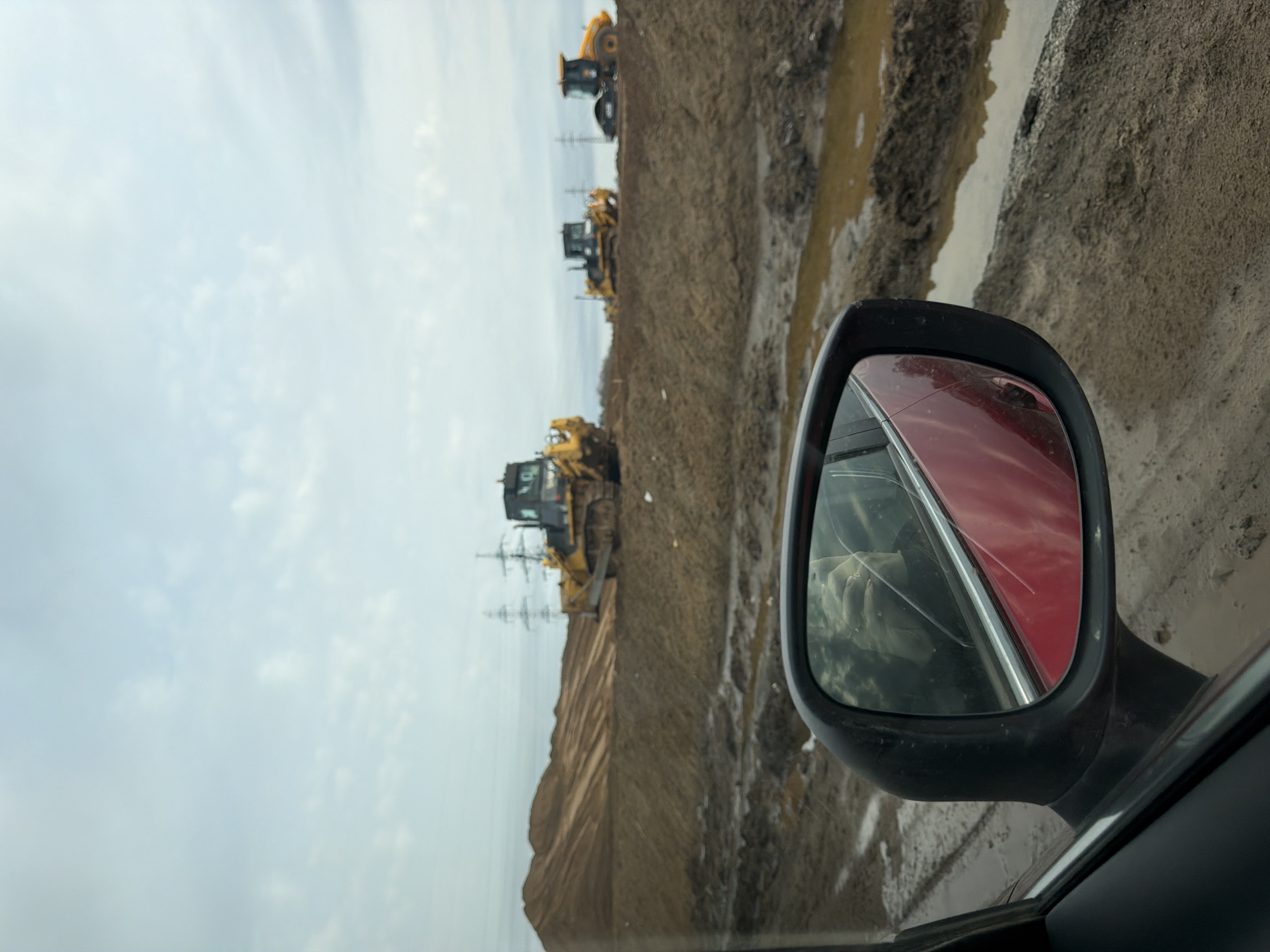 Road construction underway in Zav'yalovo, Russia early morning