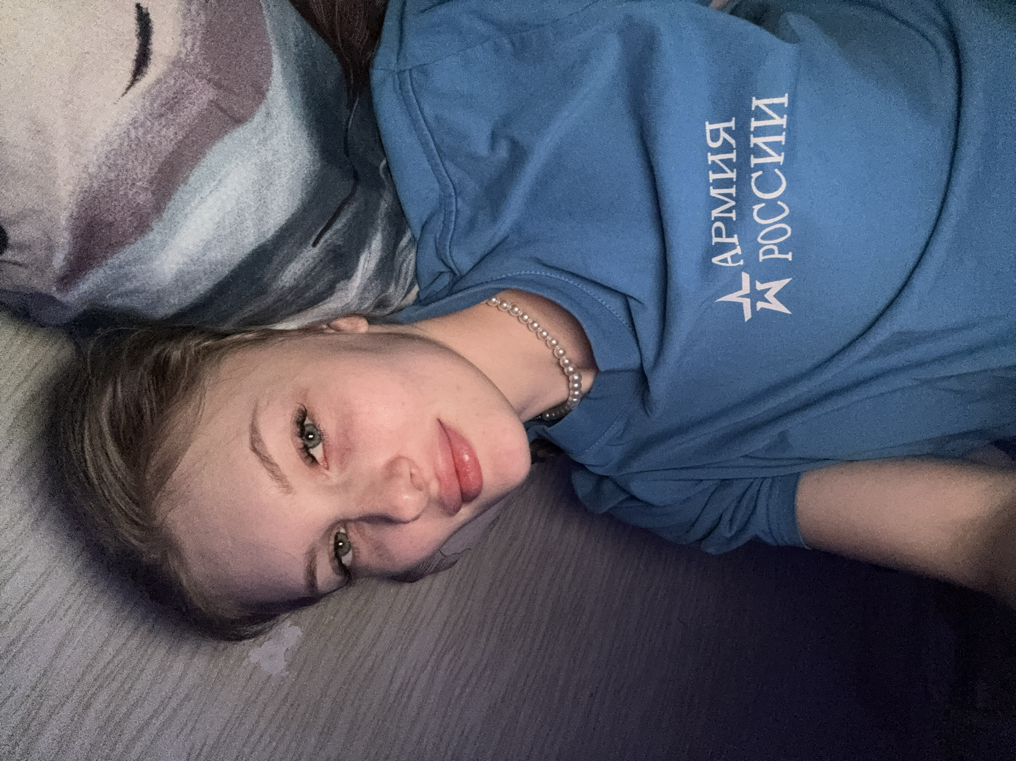 Woman documents evening selfie session in Kondratovo, Russia