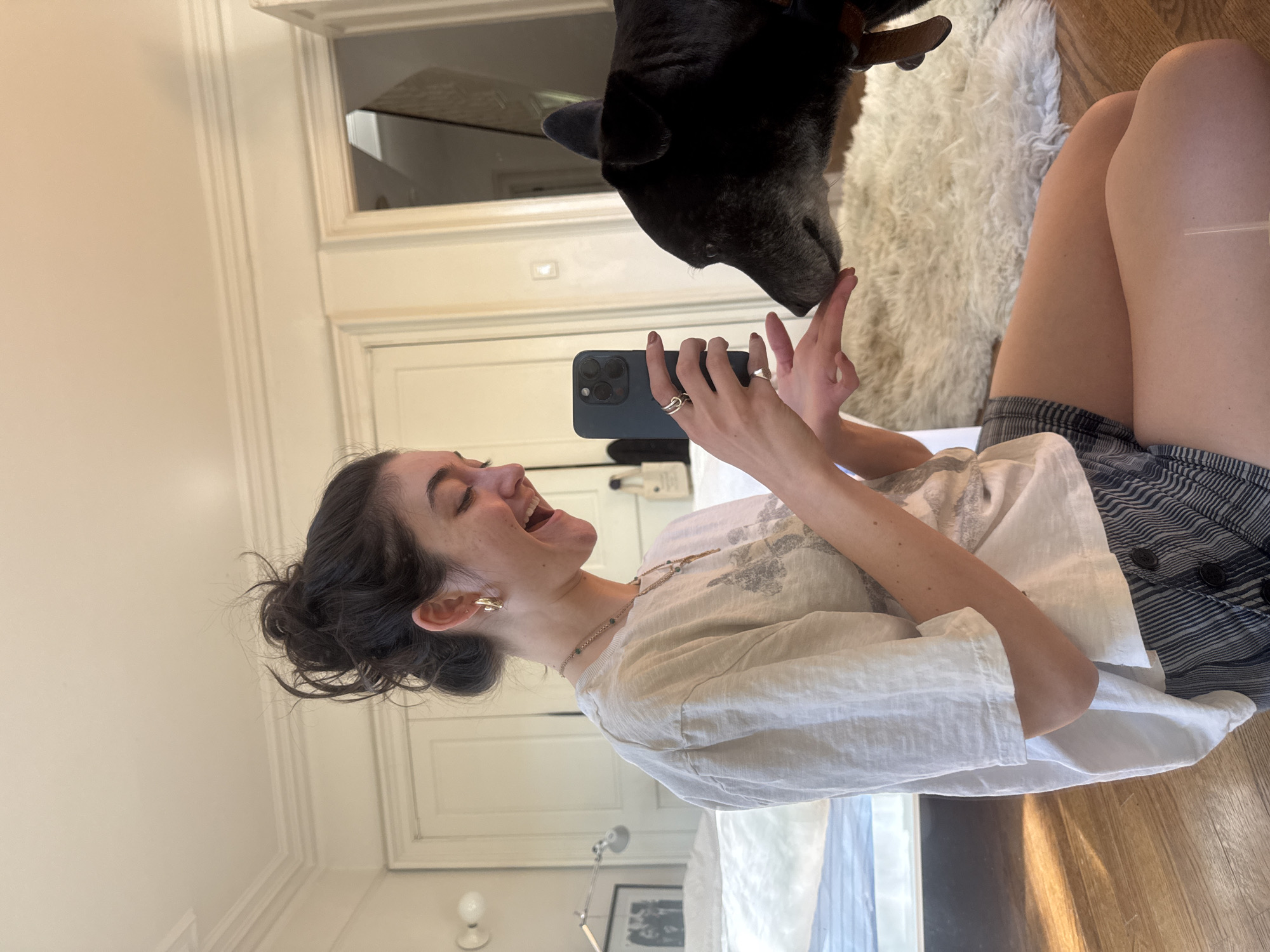 Woman documents casual evening moments with pet, selfies in NYC