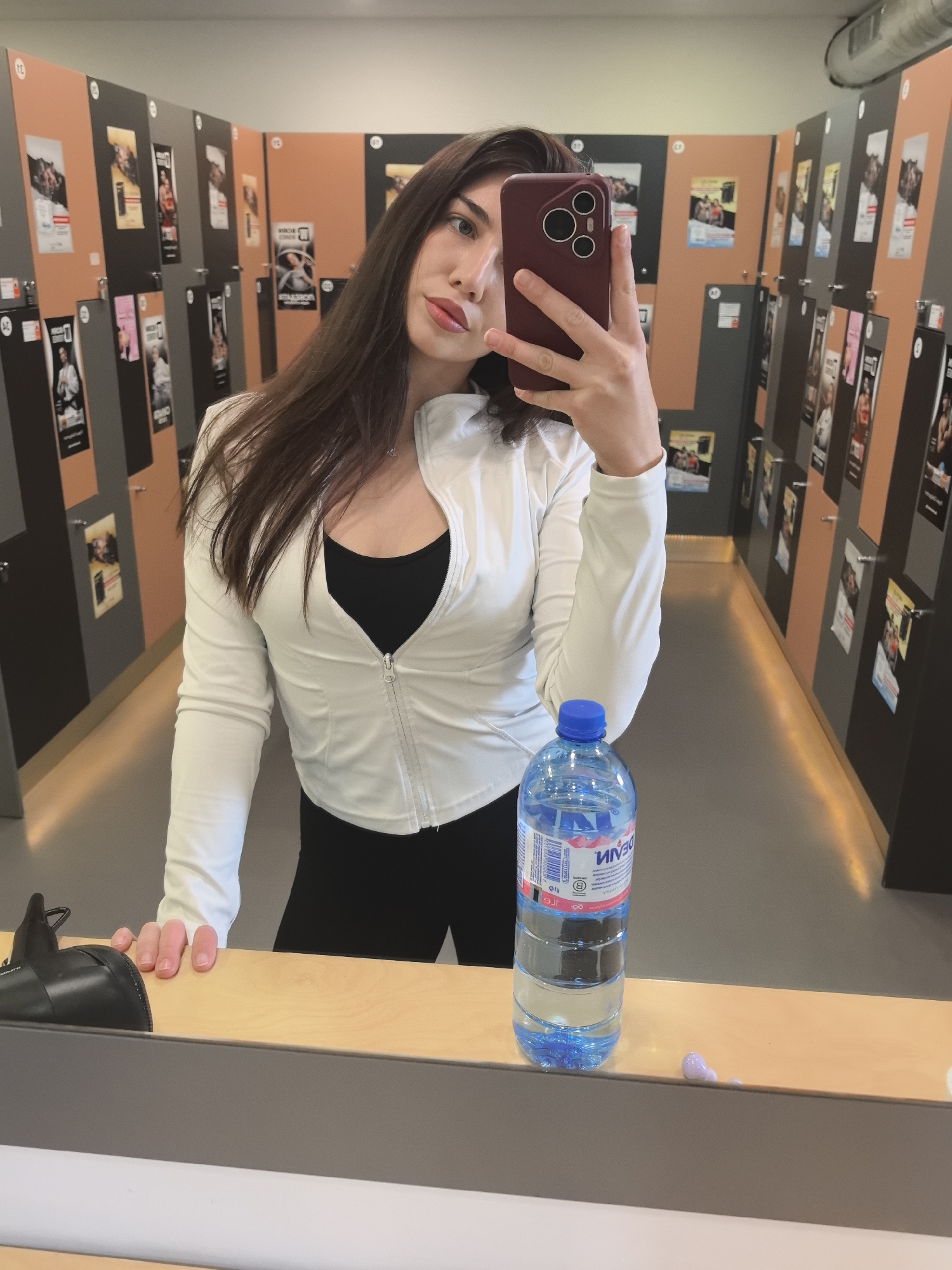 Woman Takes Mirror Selfie in Stara Zagora Locker Room