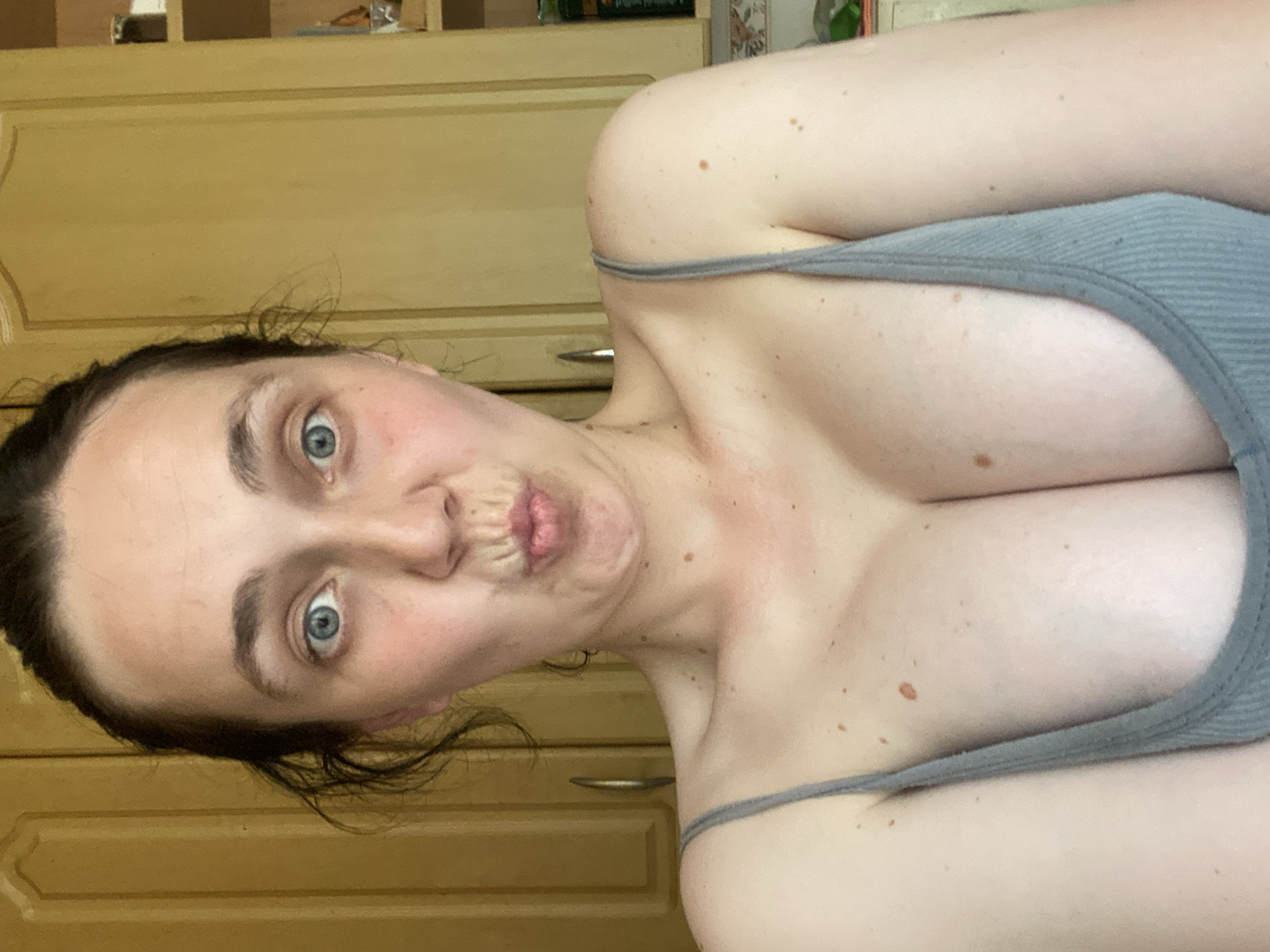 Casual indoor selfie session, multiple angles and expressions
