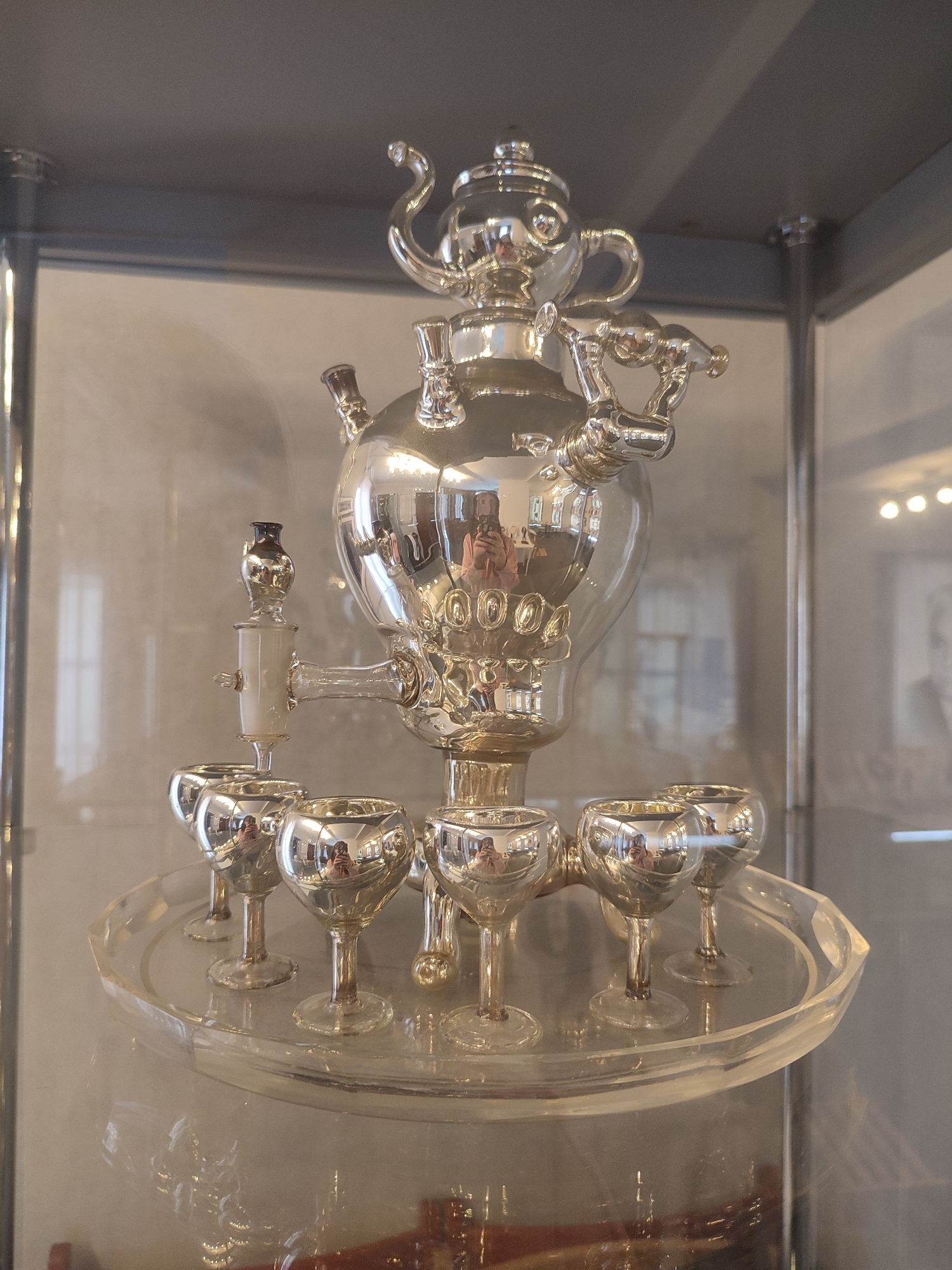 Museum visitor documents Russian cultural exhibits and architecture in Sarapul