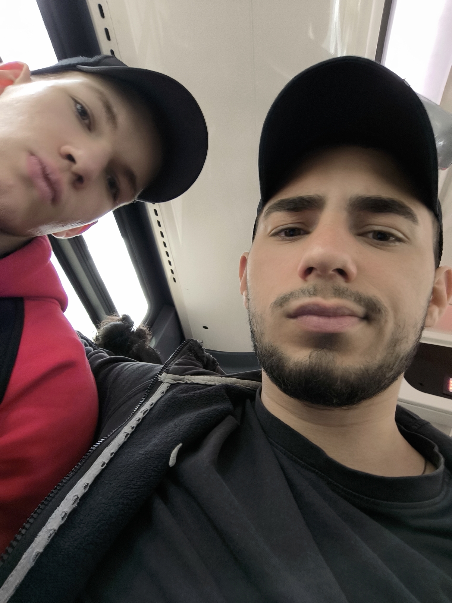 Two men take selfie on public transport in Strasbourg