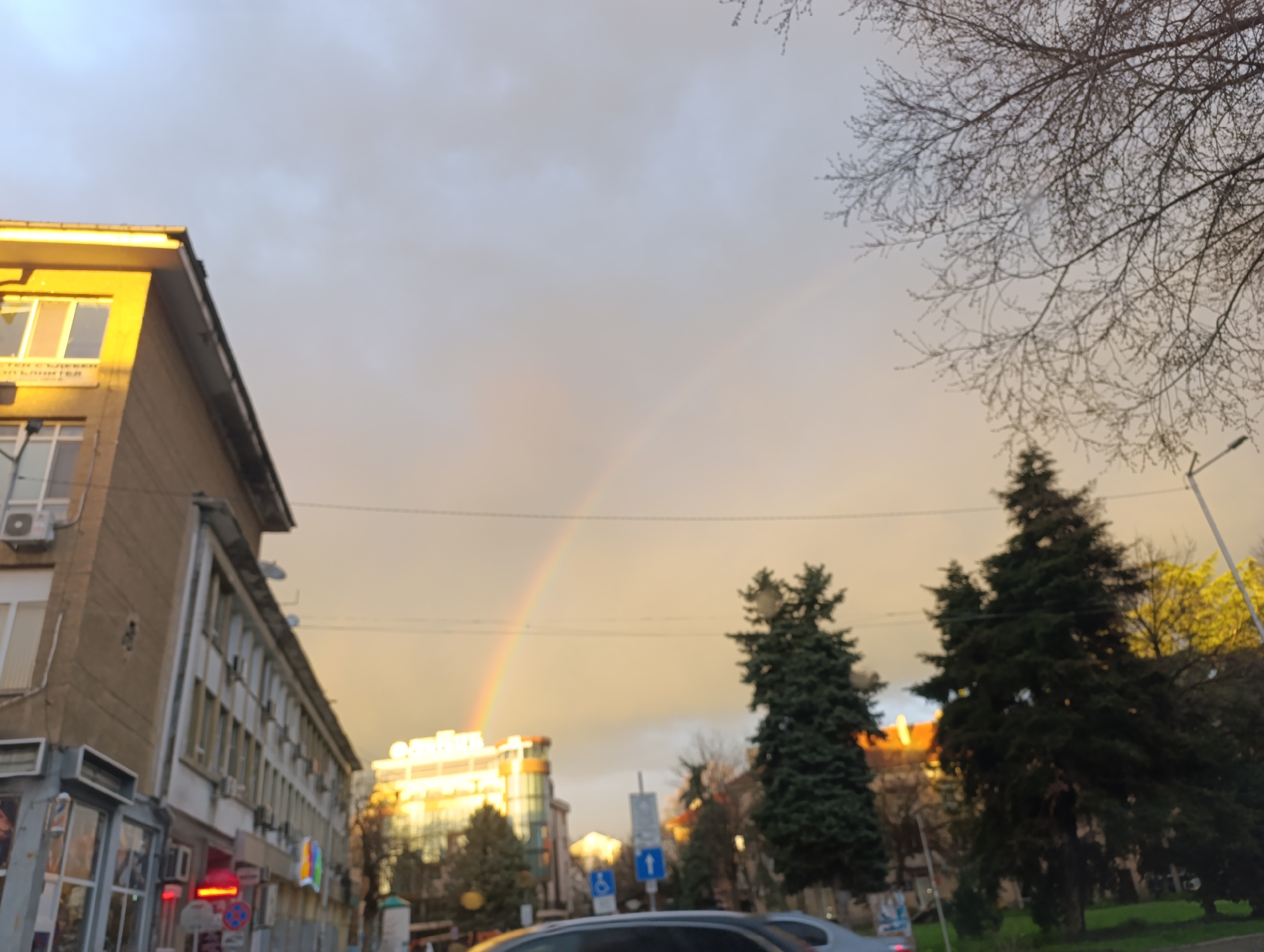 Rainbow appears over Haskovo streets and forest paths