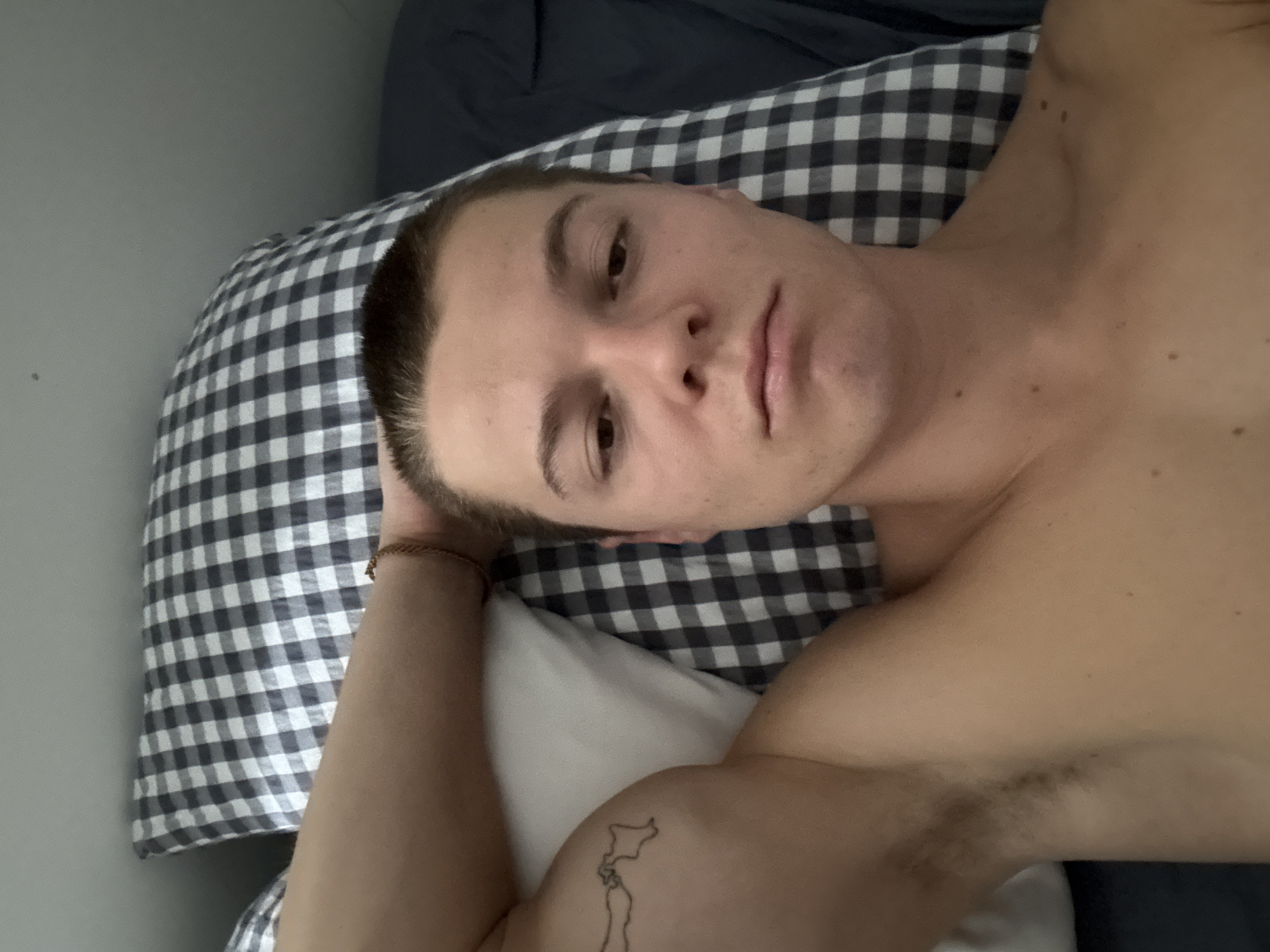 Man resting in bed observed in London morning