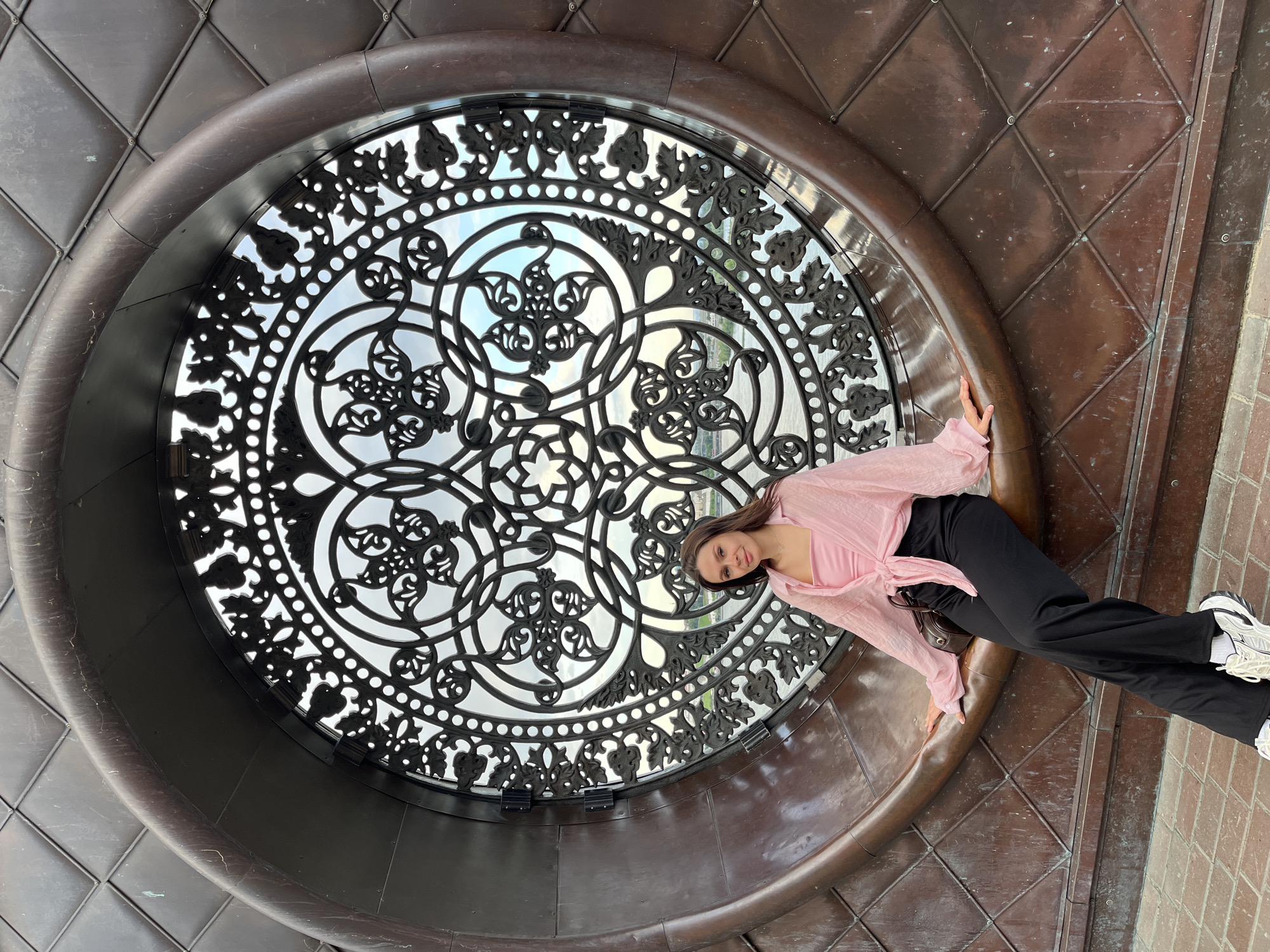 Posing at an ornate metalwork installation in Kazan