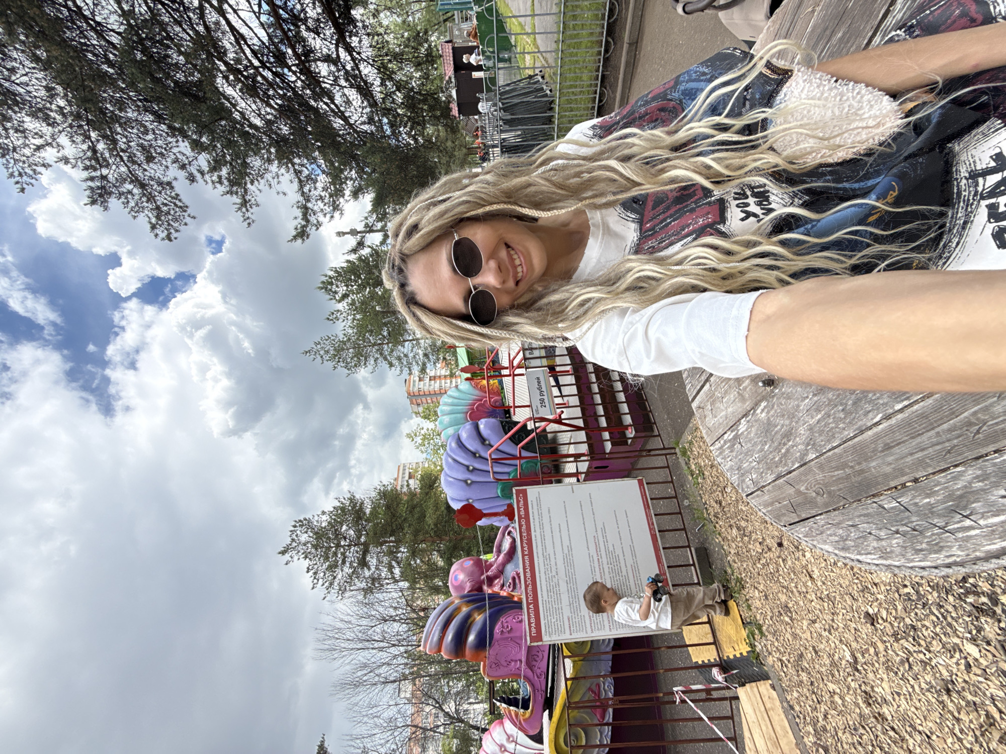 Woman takes selfie at Russian amusement park