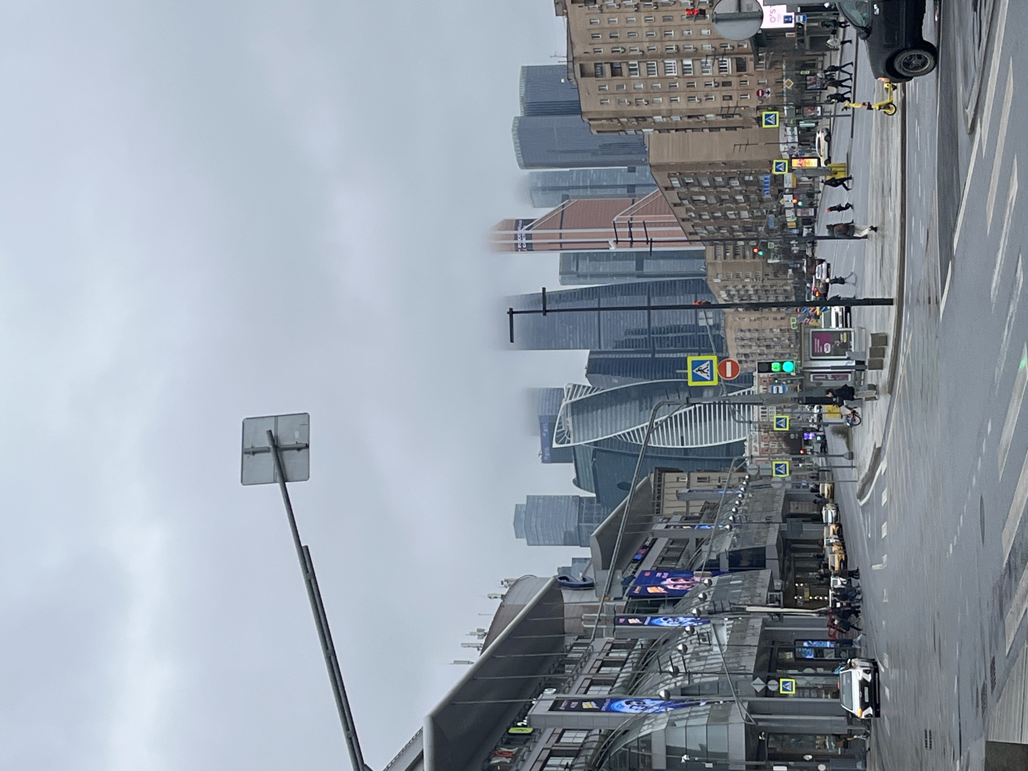 Rainy morning scenes documented across central Moscow locations
